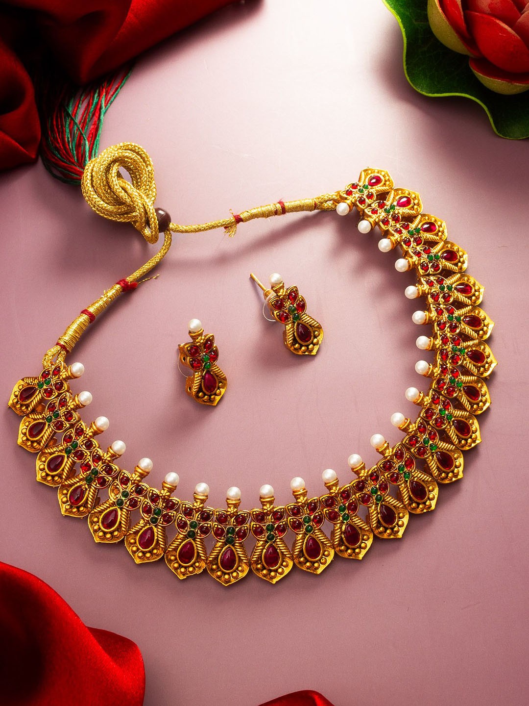 

aadita Gold-Plated Stone-Studded & Beaded Temple Choker Jewellery Set