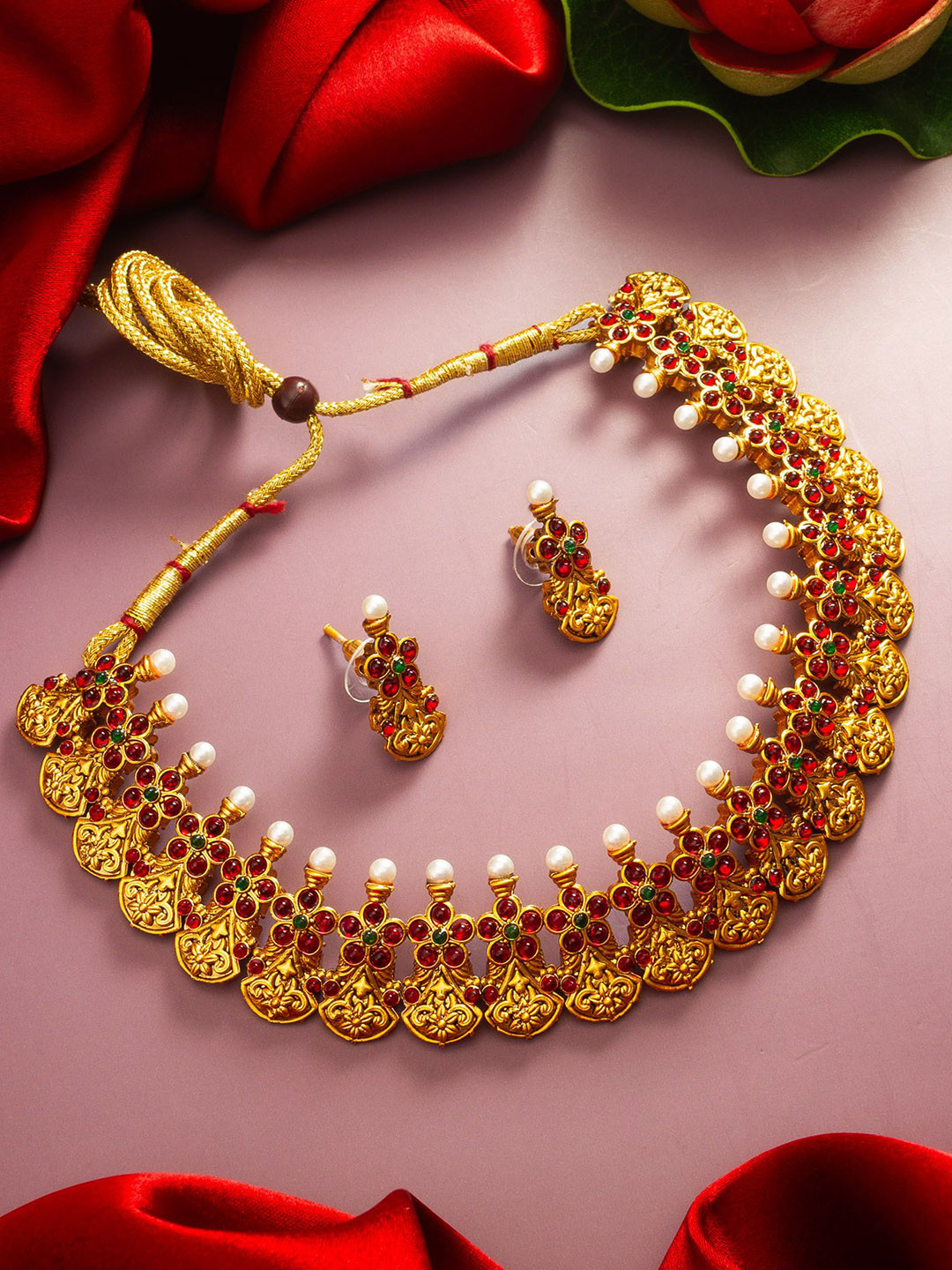 

aadita Gold-Plated Stone-Studded & Beaded Jewellery Set