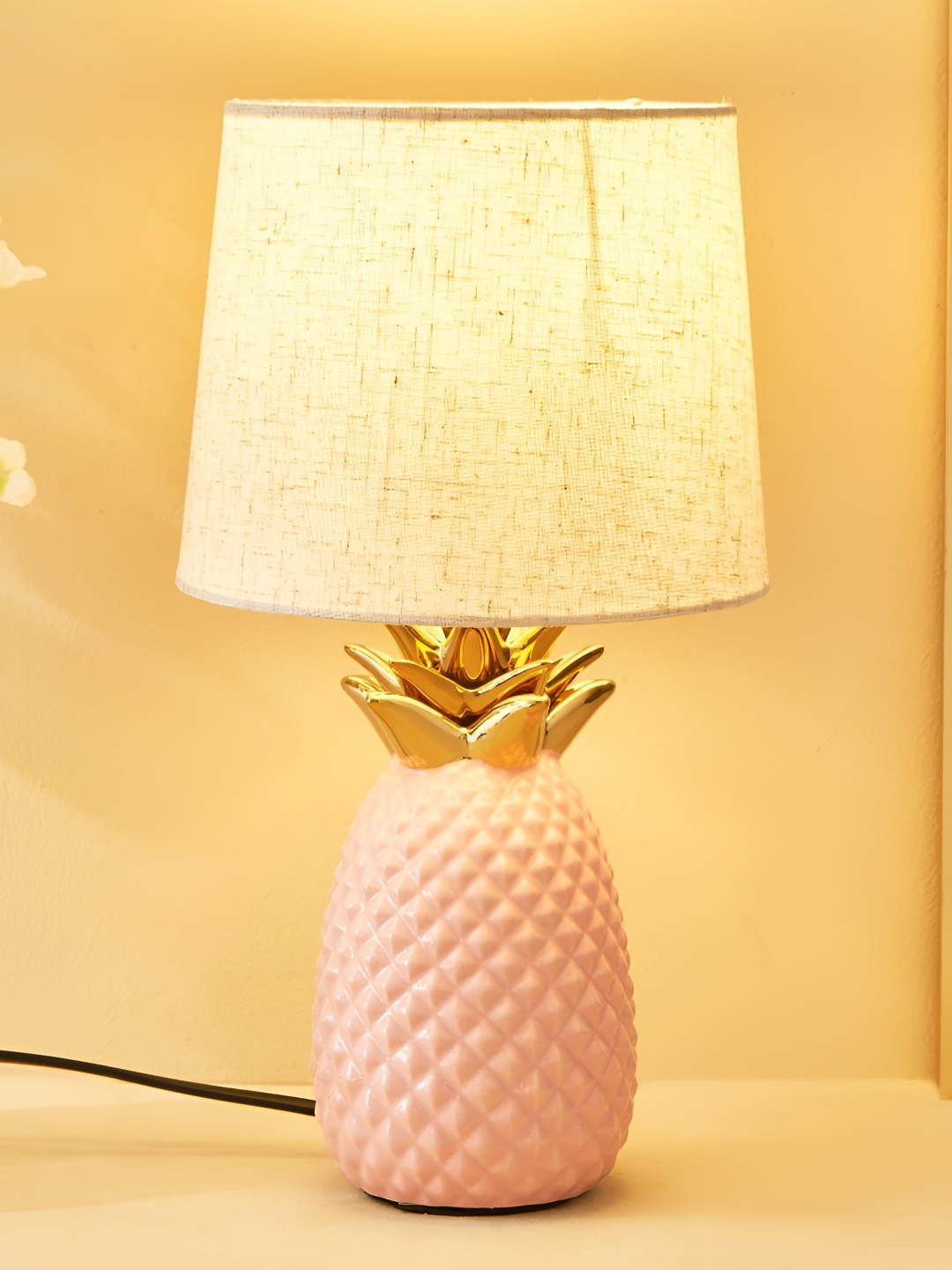 

Home Centre Monolith Marvel Pink Textured Ceramic Frusturical Shaped Table Lamp