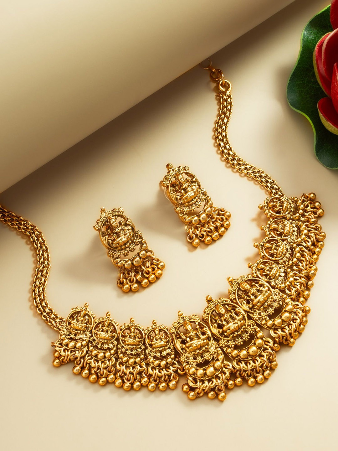 

aadita Gold-Plated Stone Studded & Beaded Jewellery Set