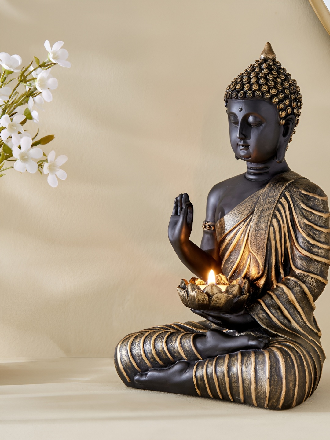

Home Centre Black Buddha Figurine Showpiece