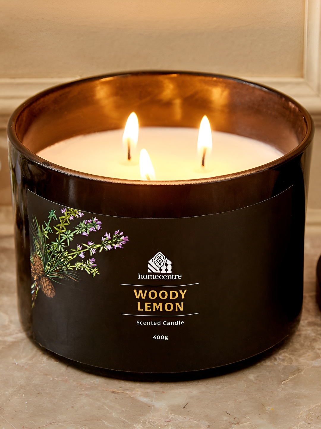 

Home Centre Black Enchanted Woody Lemon Scented Jar Candle