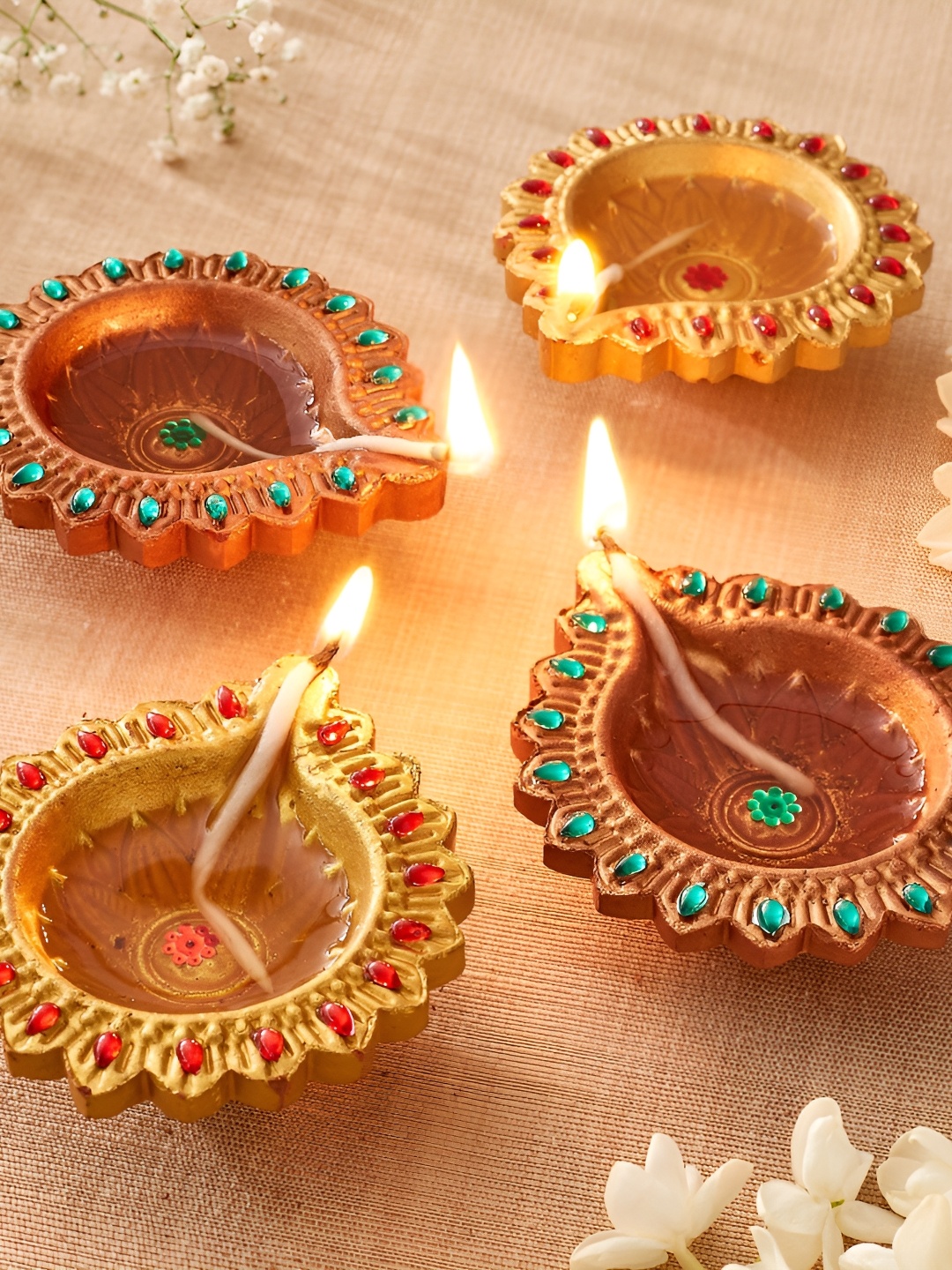 

Home Centre Set Of 4 Earthen Clay Embellished Leaf Diyas, Brown