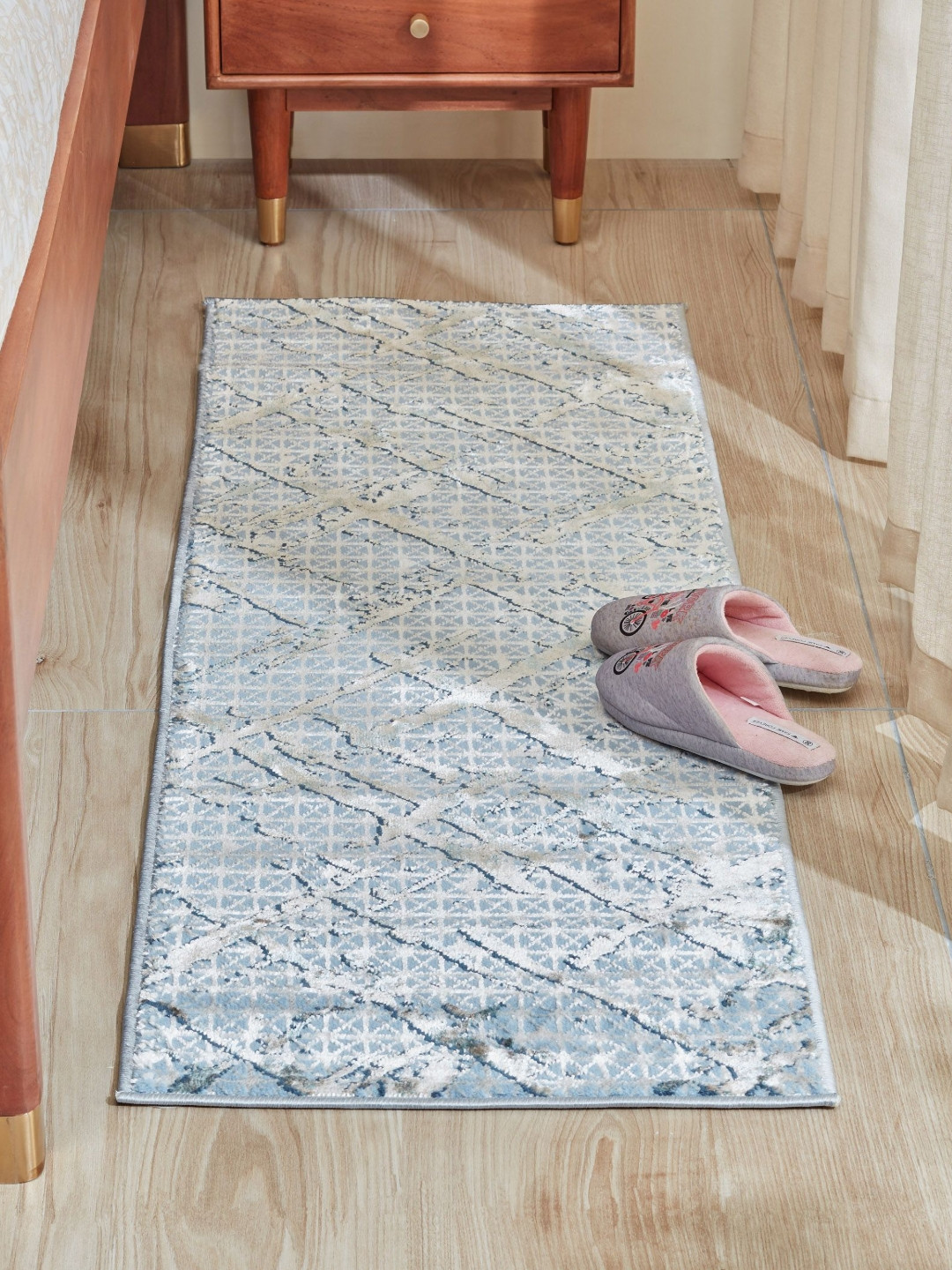 

Home Centre Zephyr Juno Blue and White Geometric Printed Anti Skid Bedroom Runners
