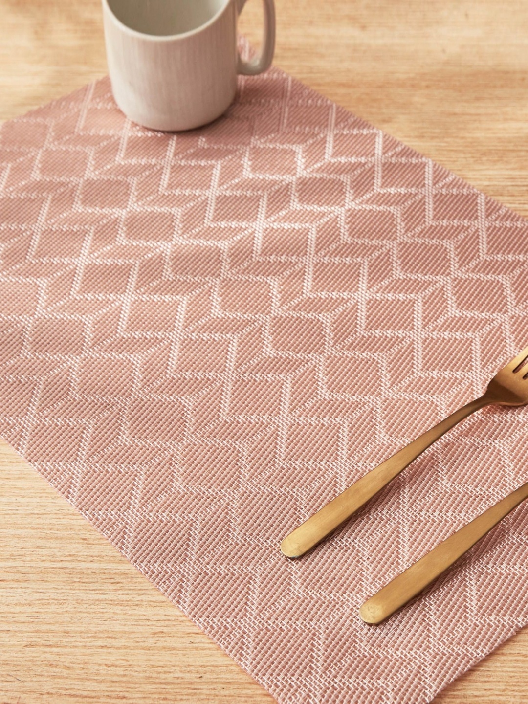 

Home Centre Eden 6Pcs Pink Geometric Rectangle Table Placemats
