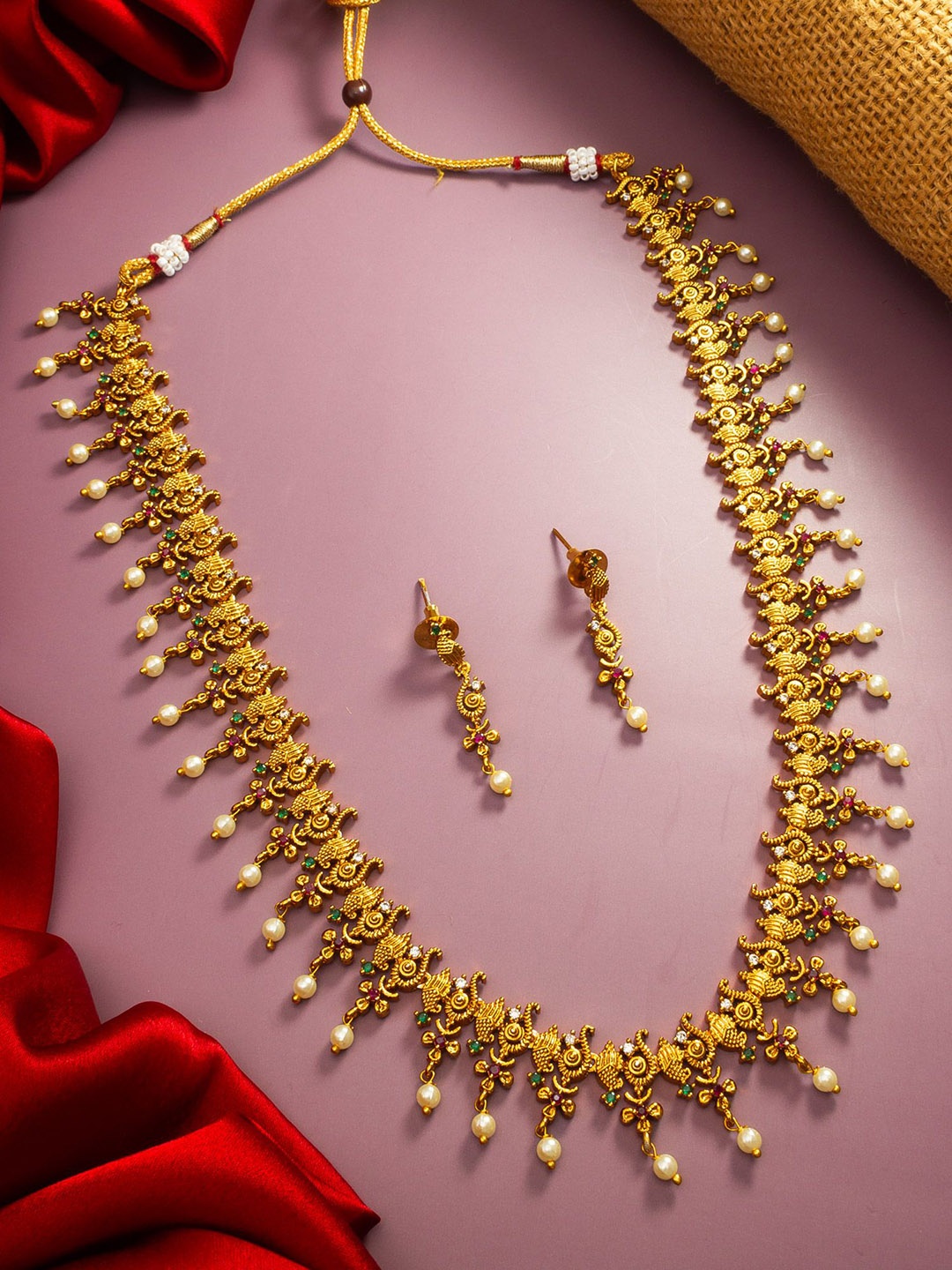 

aadita Gold-Plated Stone Studded & Beaded Jewellery Set