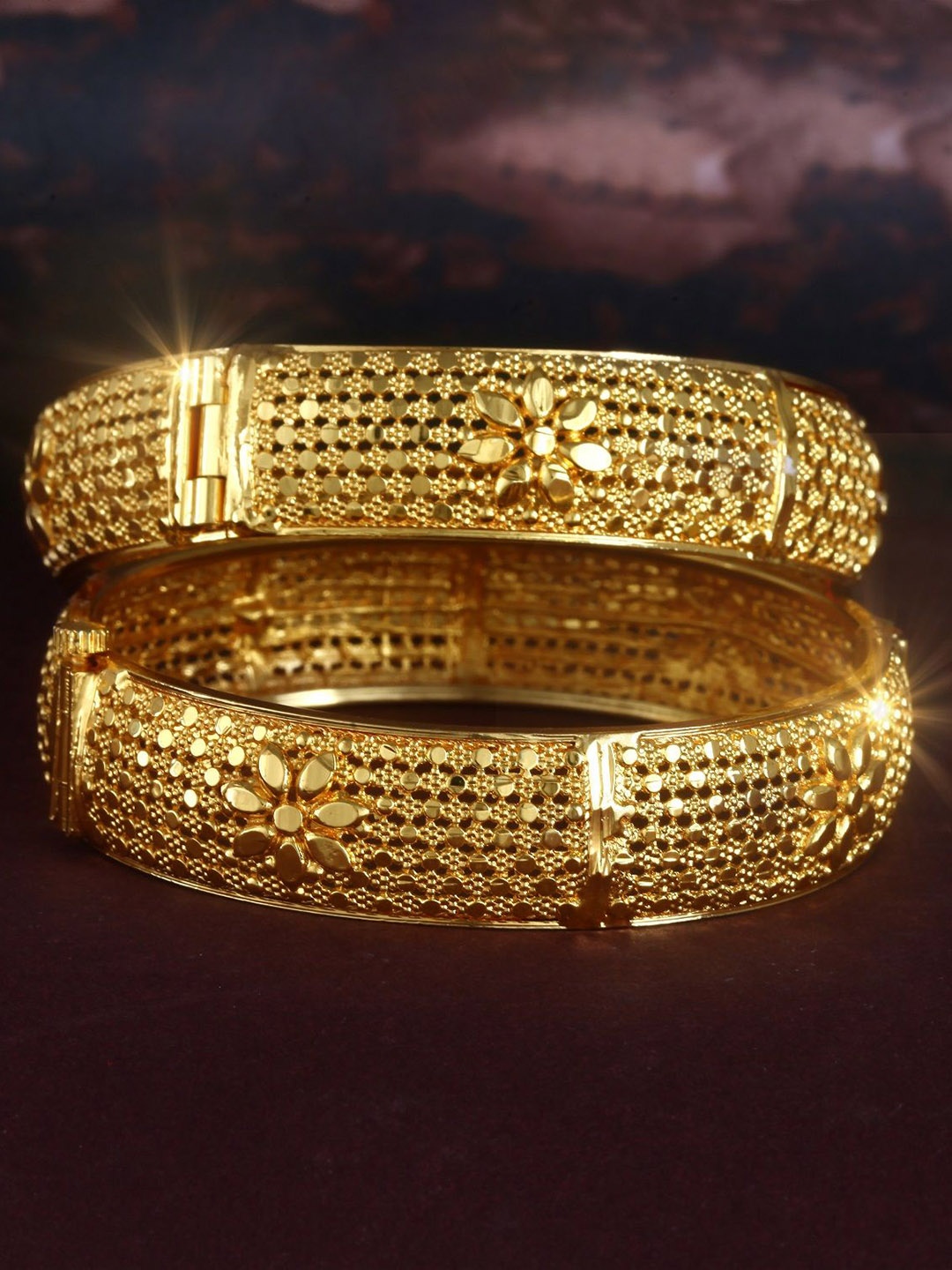 

Vighnaharta Set Of 2 Gold Plated Textured Bangles