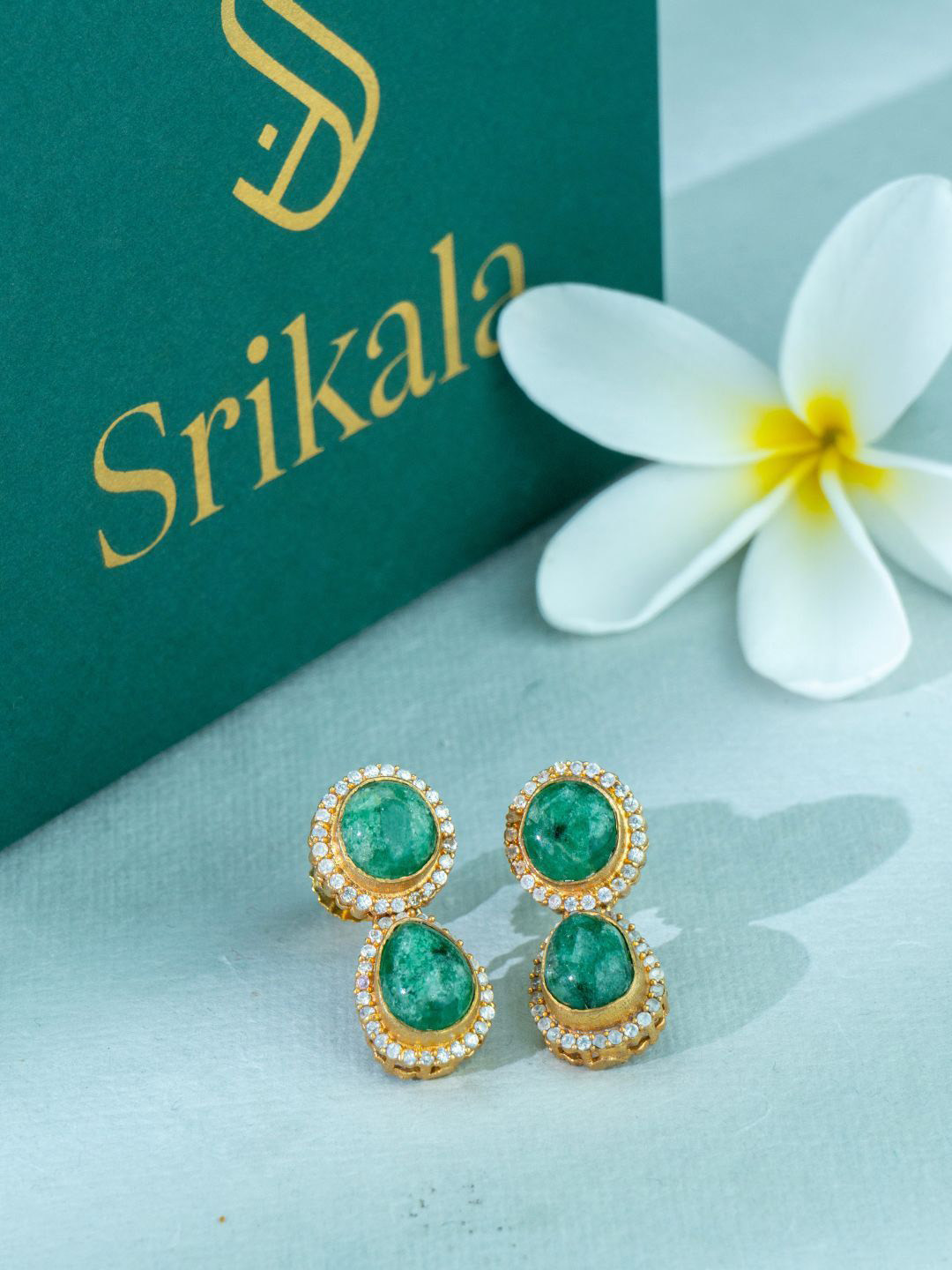 

srikala Gold-Plated Contemporary Stone Studded Drop Earrings