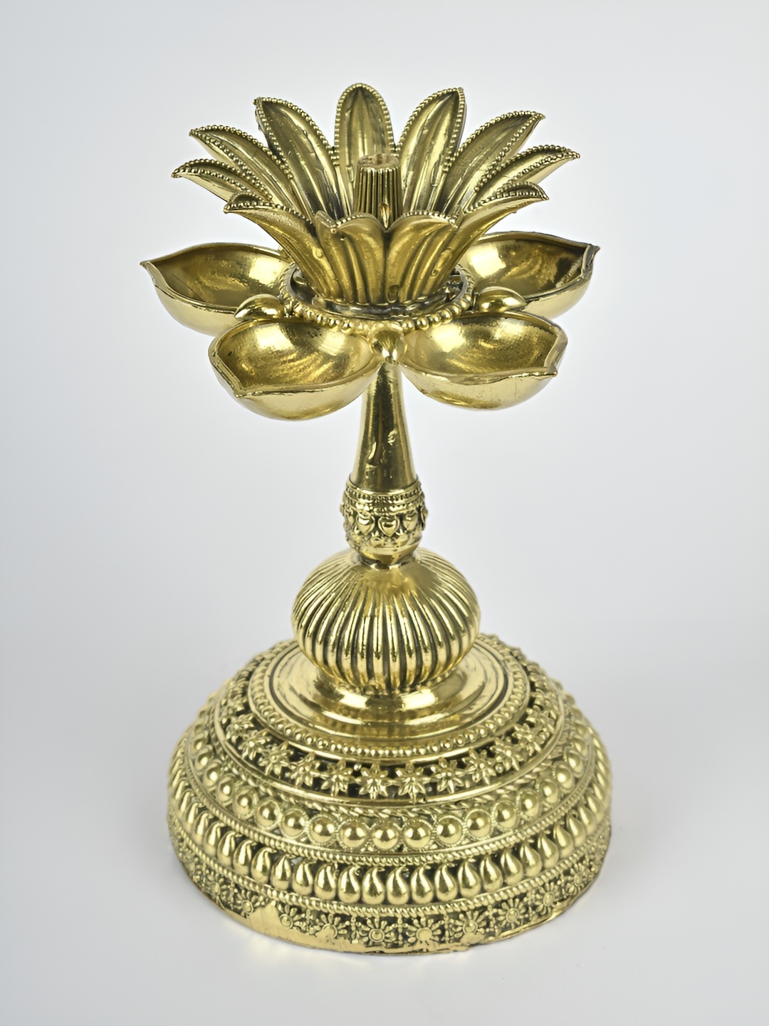 

Exotic India Yellow Textured Brass Diya