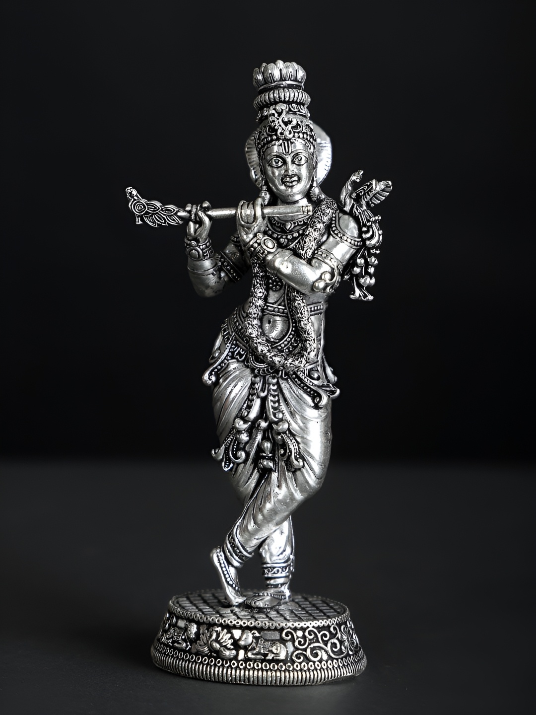 

Exotic India Superfine Standing Lord Krishna Playing Flute - Silver Plated Brass Statue