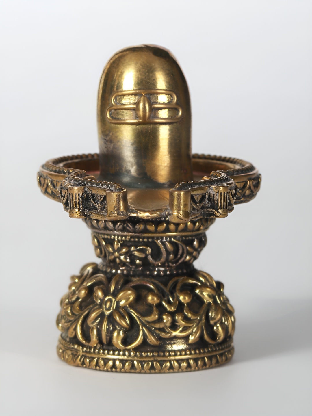 

Exotic India 2" Small Brass Superfine Floral Shiva Linga Idol, Gold