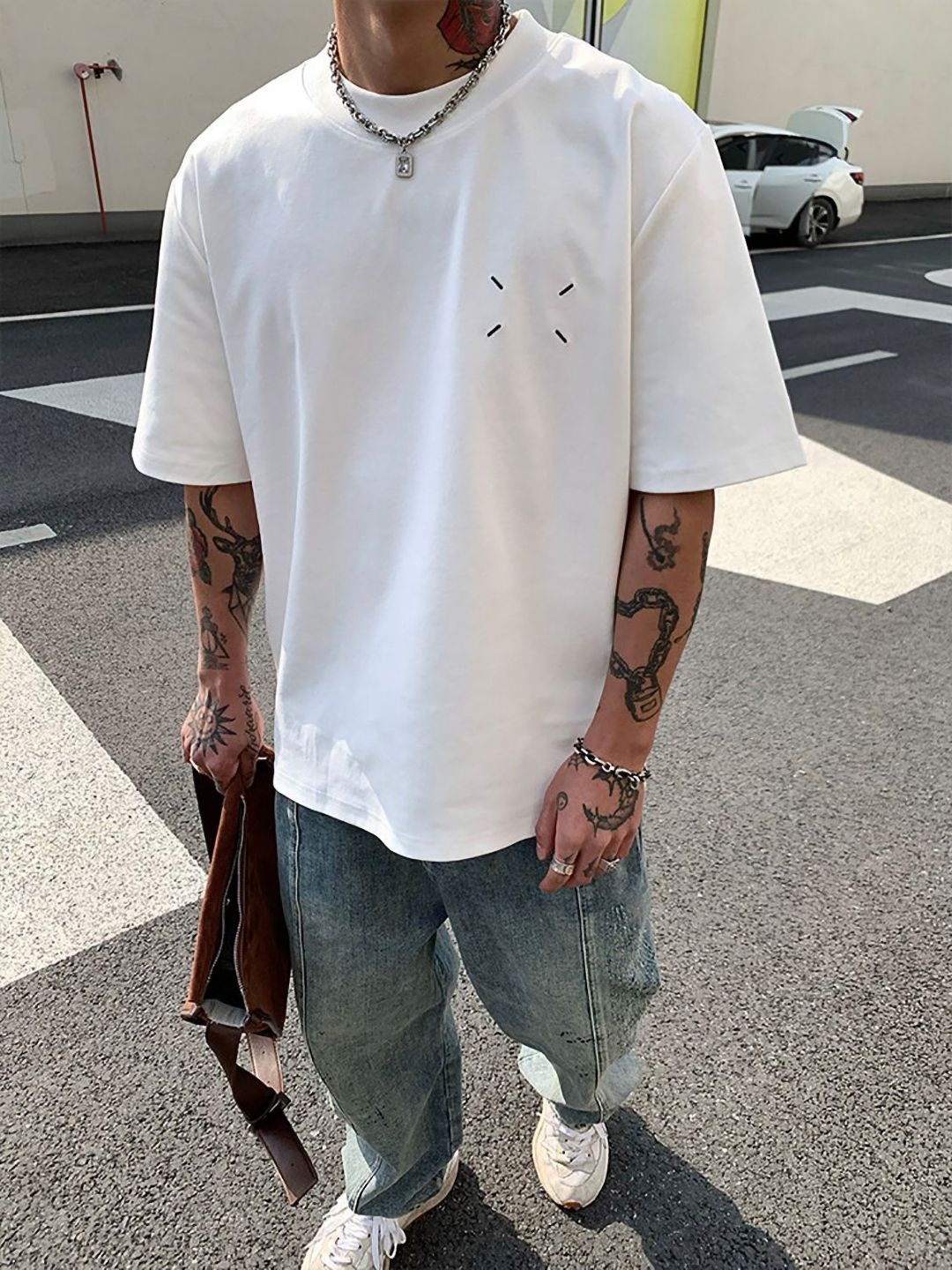 

StyleCast x Revolte Men Solid Round Neck Cotton Oversized T-shirt, White