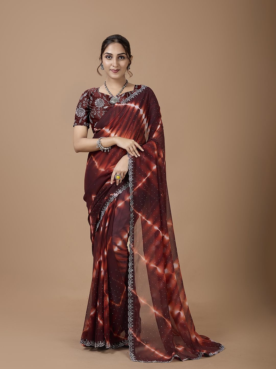 

NIRMAL CREATION Ethnic Motifs Printed Embroidered Saree, Maroon