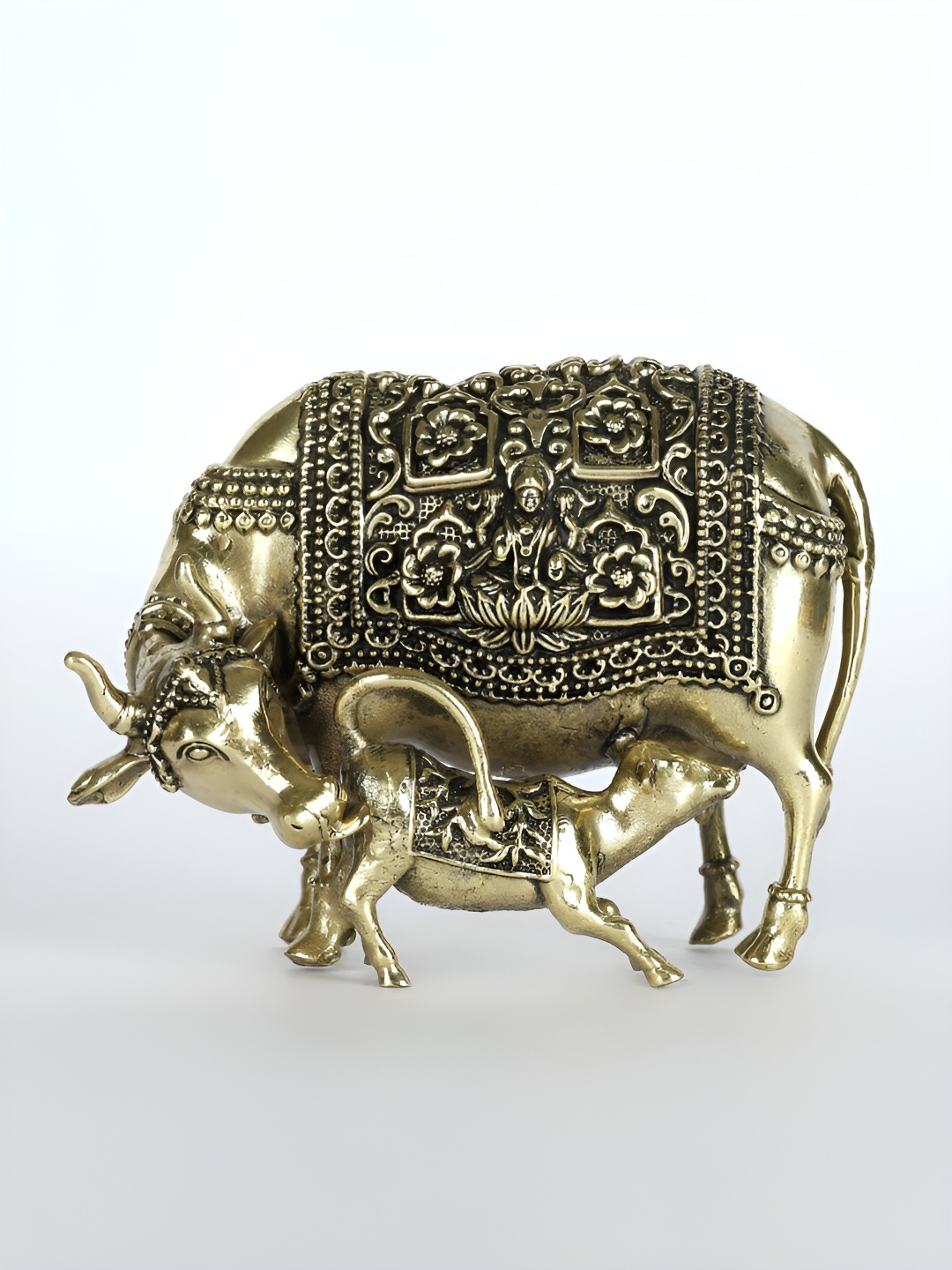 

Exotic India 4" Small Superfine Cow and Calf Brass Statue with Lakshmi and Ganesha Carving, Gold