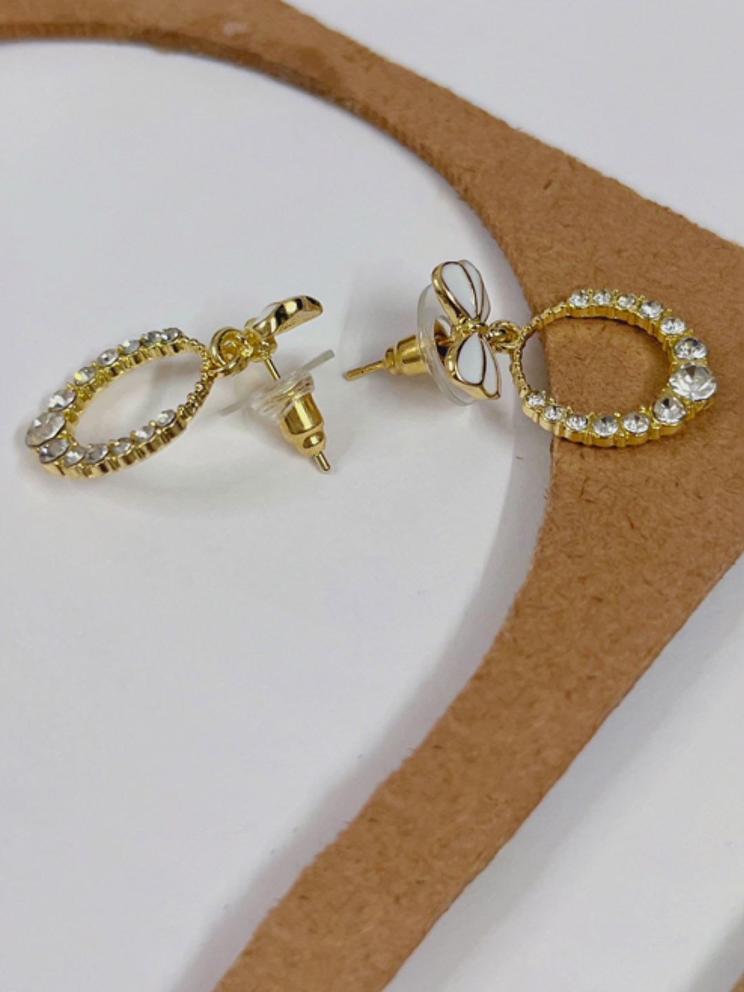 

SUBHAGALANKAR Gold-Plated Stone Studded Bow Round Oval Drop Earrings
