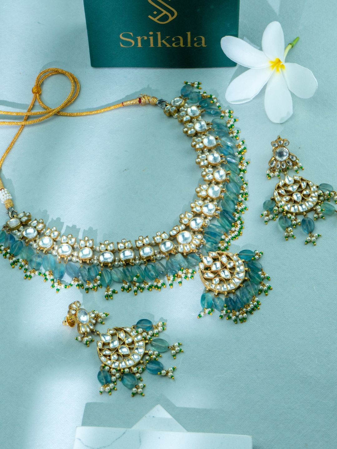 

srikala Gold-Plated Stone-Studded & Beaded Jewellery Set