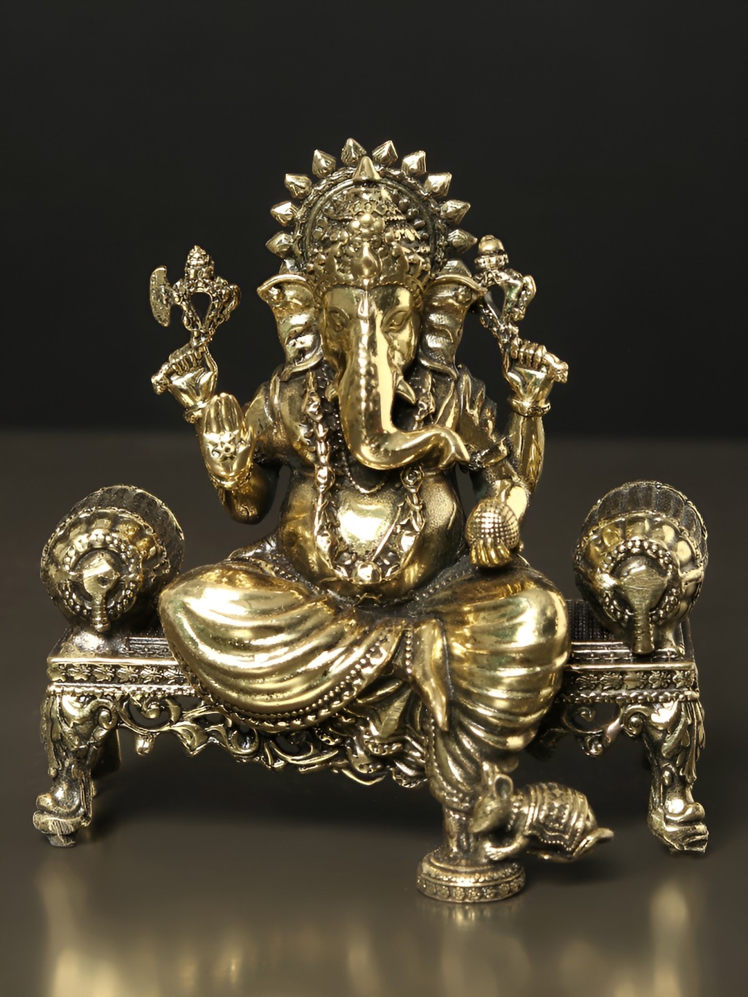 

Exotic India 3" Small Superfine Lord Ganesha Seated on Singhasan - Brass Statue, Gold