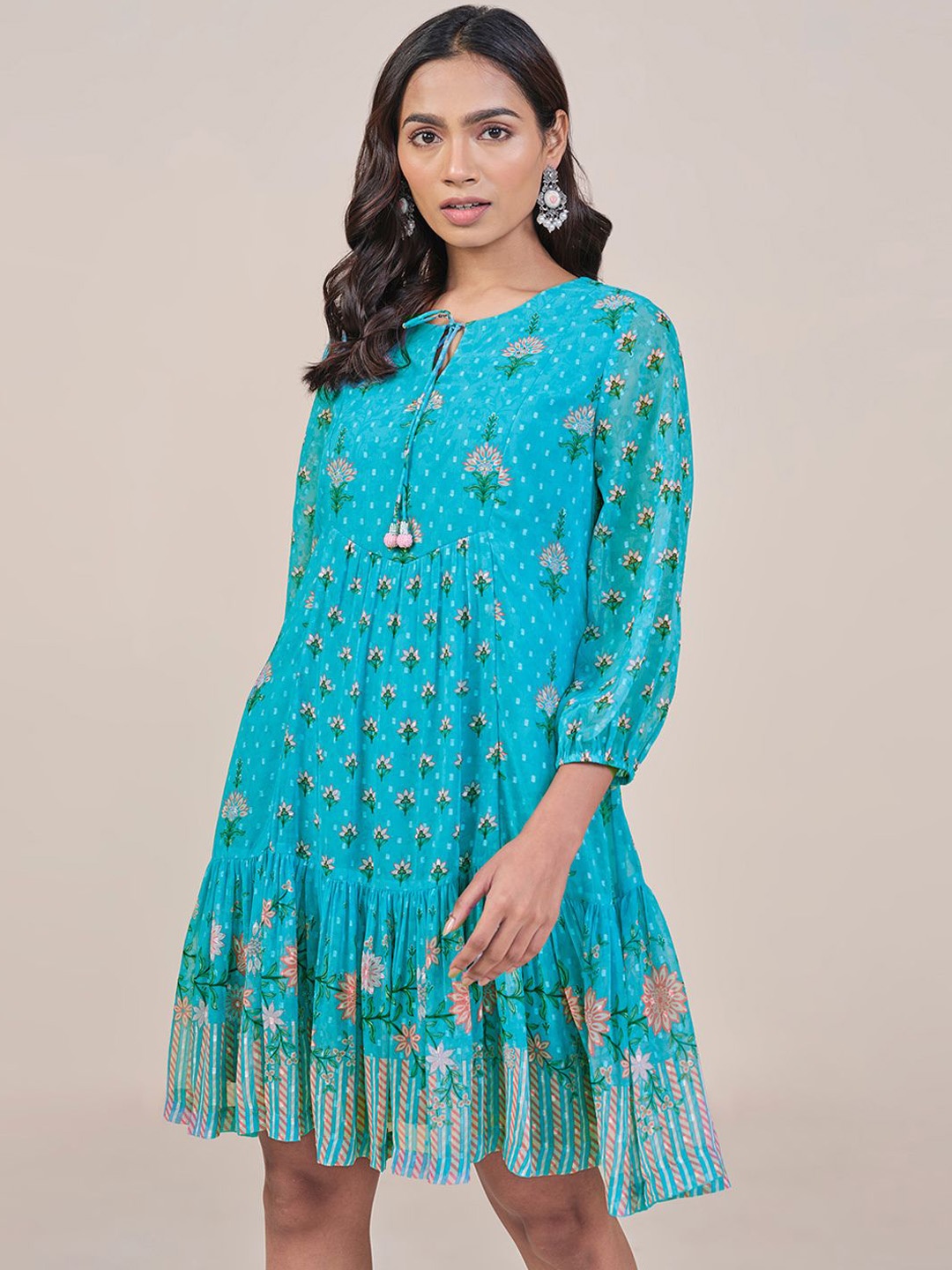 

Global Desi Women Blue Flared Tie Up Neck Knee Length Dress