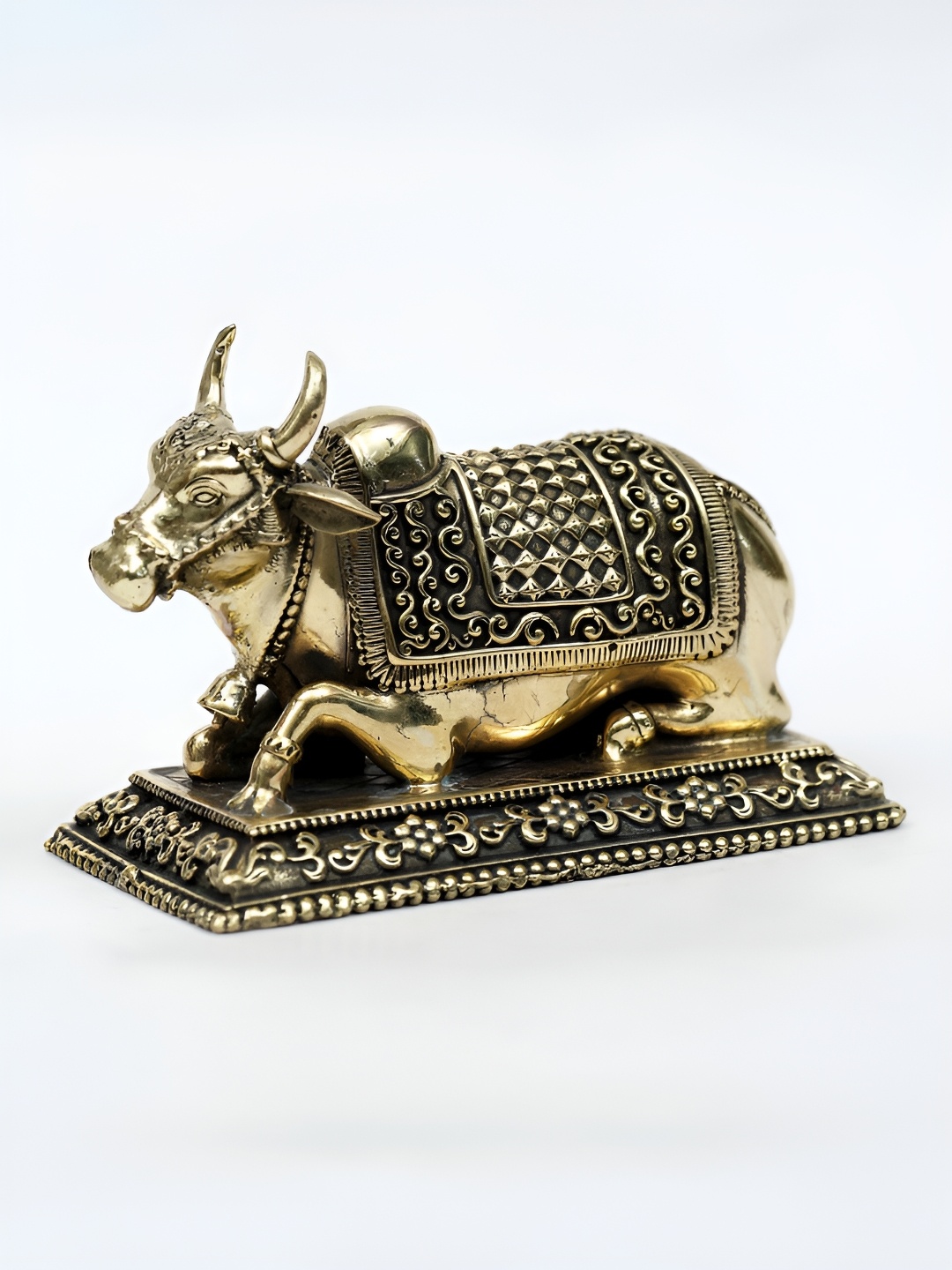 

Exotic India Brass Decorated Nandi Statue, Yellow