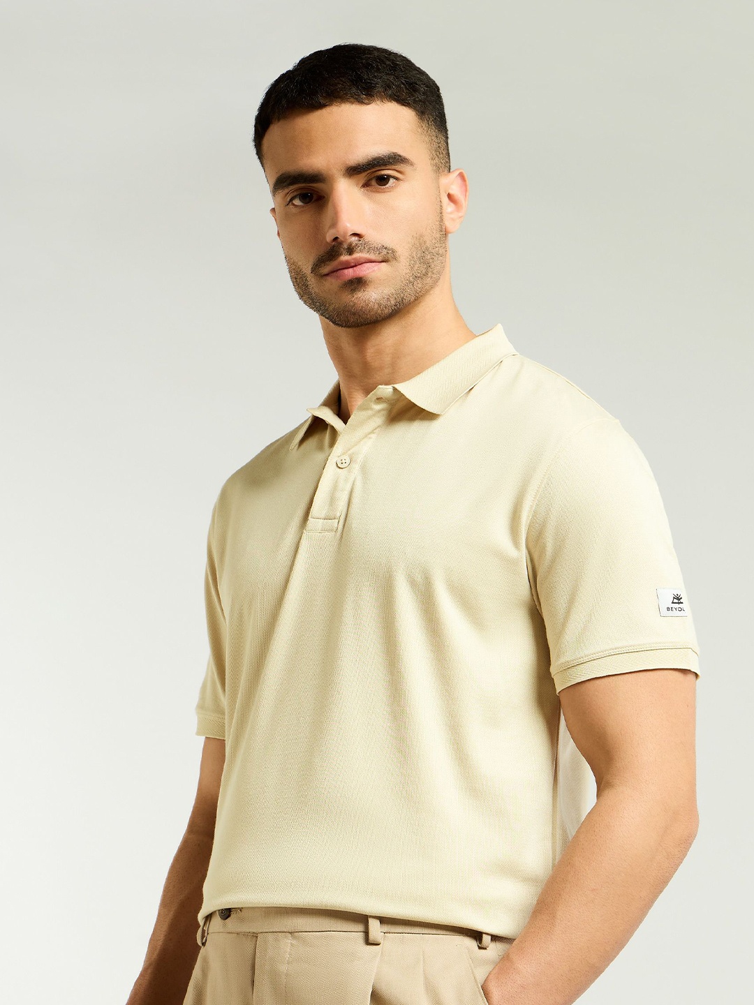 

Beyoung Men Solid Polo Collar Cotton T-shirt, Beige