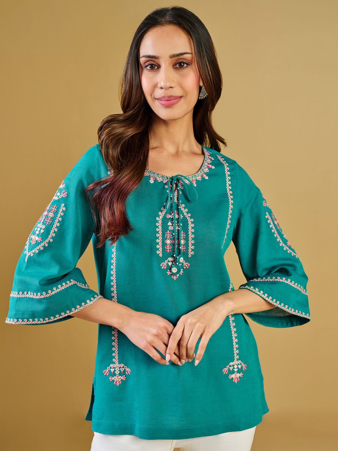 

Global Desi Women Blue Tie-Up Neck Flared Sleeve Top