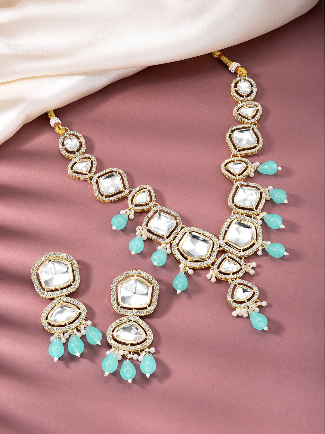 

Peora Gold-Plated Stone-Studded & Beaded Jewellery Set