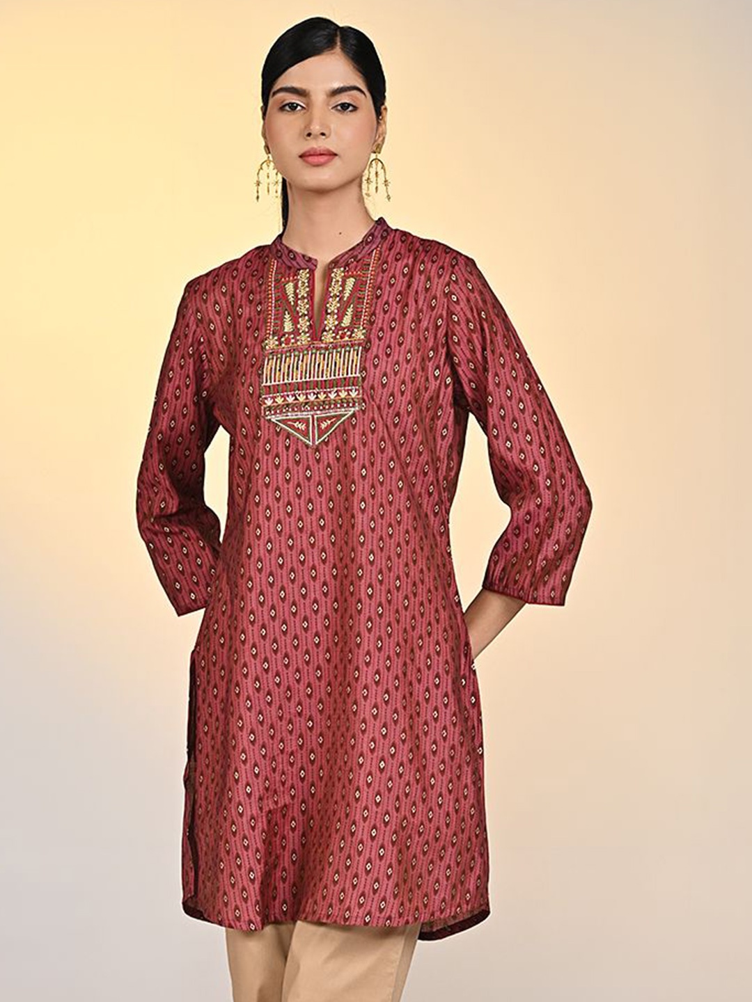 

Lakshita Women Ethnic Motifs Printed Thread Work Thread Work Kurti, Rust