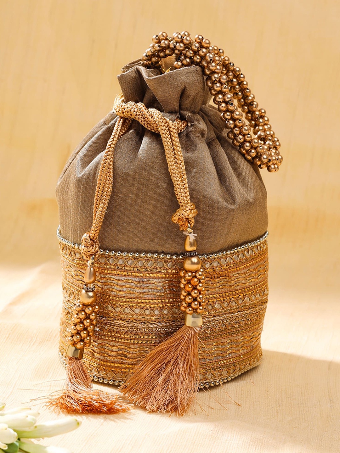 

Yellow Chimes Embroidered Potli Bag, Brown