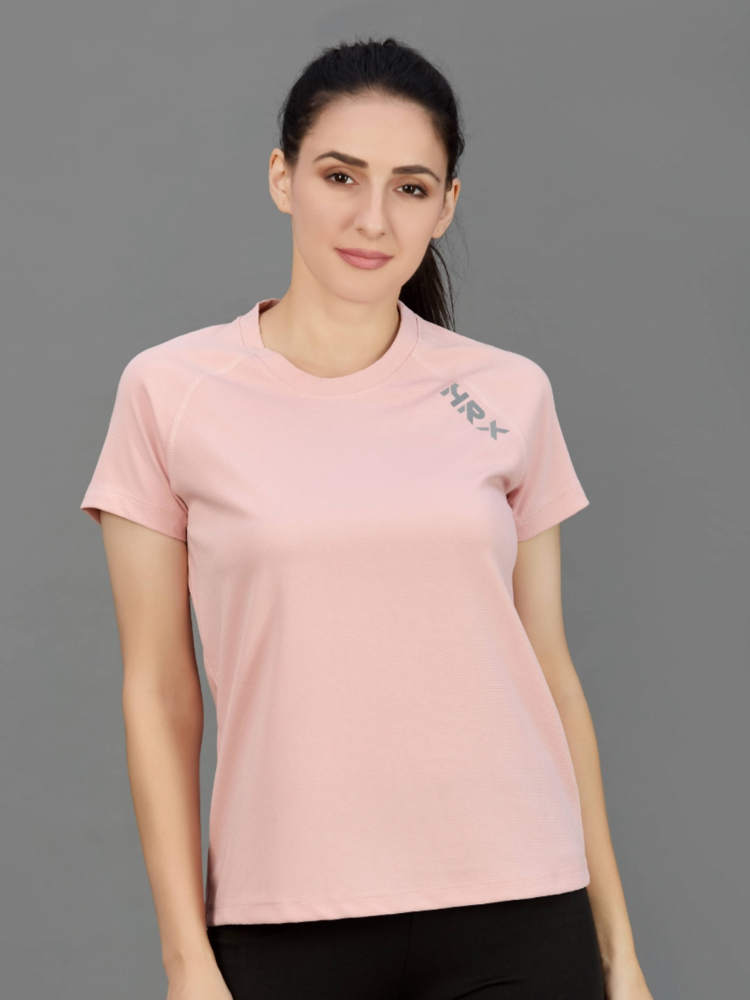 

HRX by Hrithik Roshan Women Solid Round Neck T-shirt, Peach