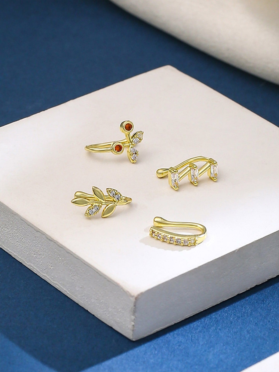 

Yellow Chimes Set Of 4 Gold-Plated Stone Studded Ring Nosepins