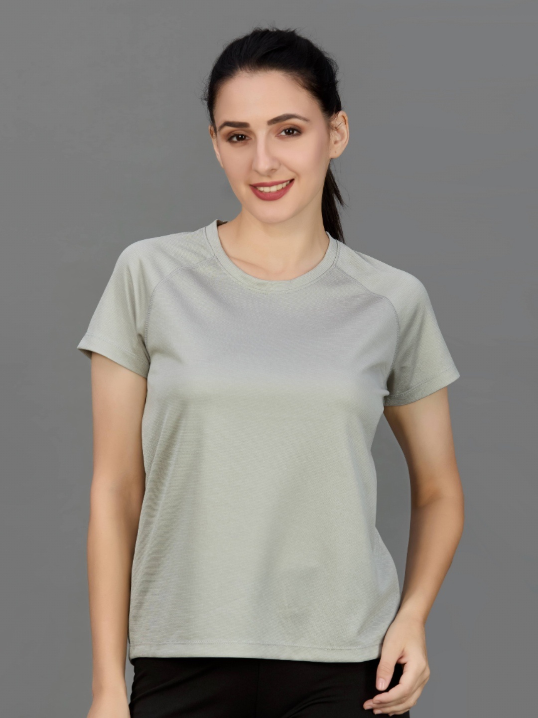 

HRX by Hrithik Roshan Women Solid Round Neck T-shirt, Grey