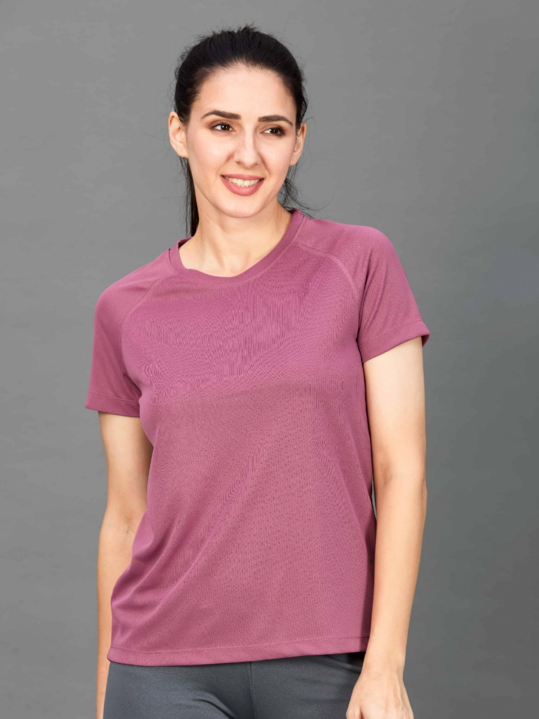 

HRX by Hrithik Roshan Women Solid Round Neck T-shirt, Pink