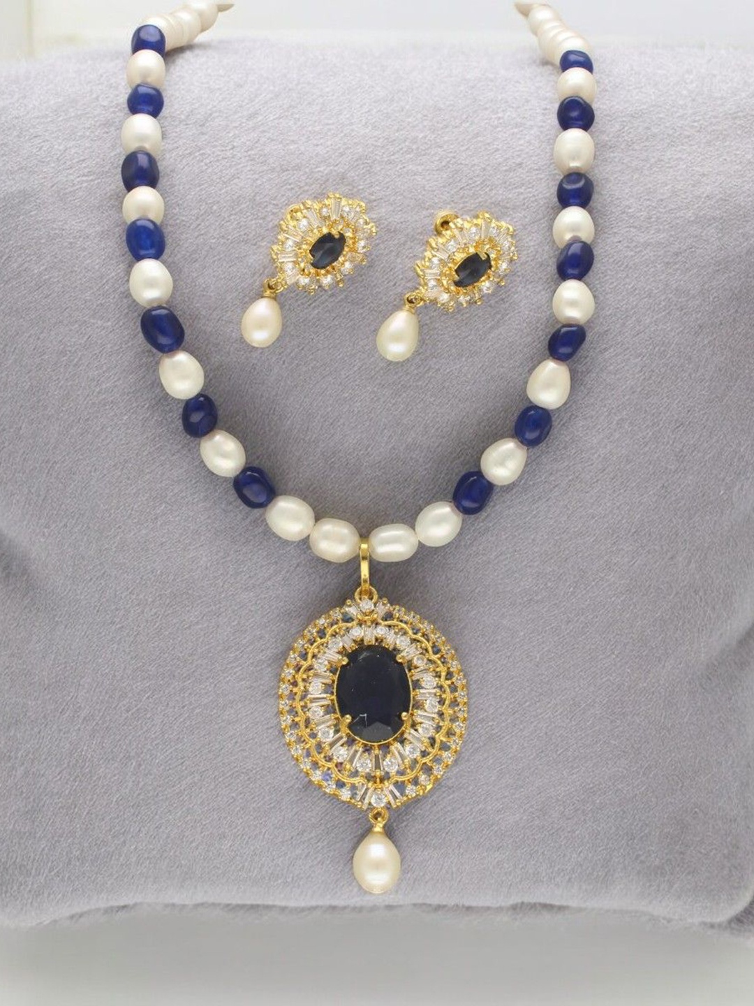 

Sri Jagdamba Pearls Dealer Gold- Plated Pearl & Stone Studded Jewellery Set