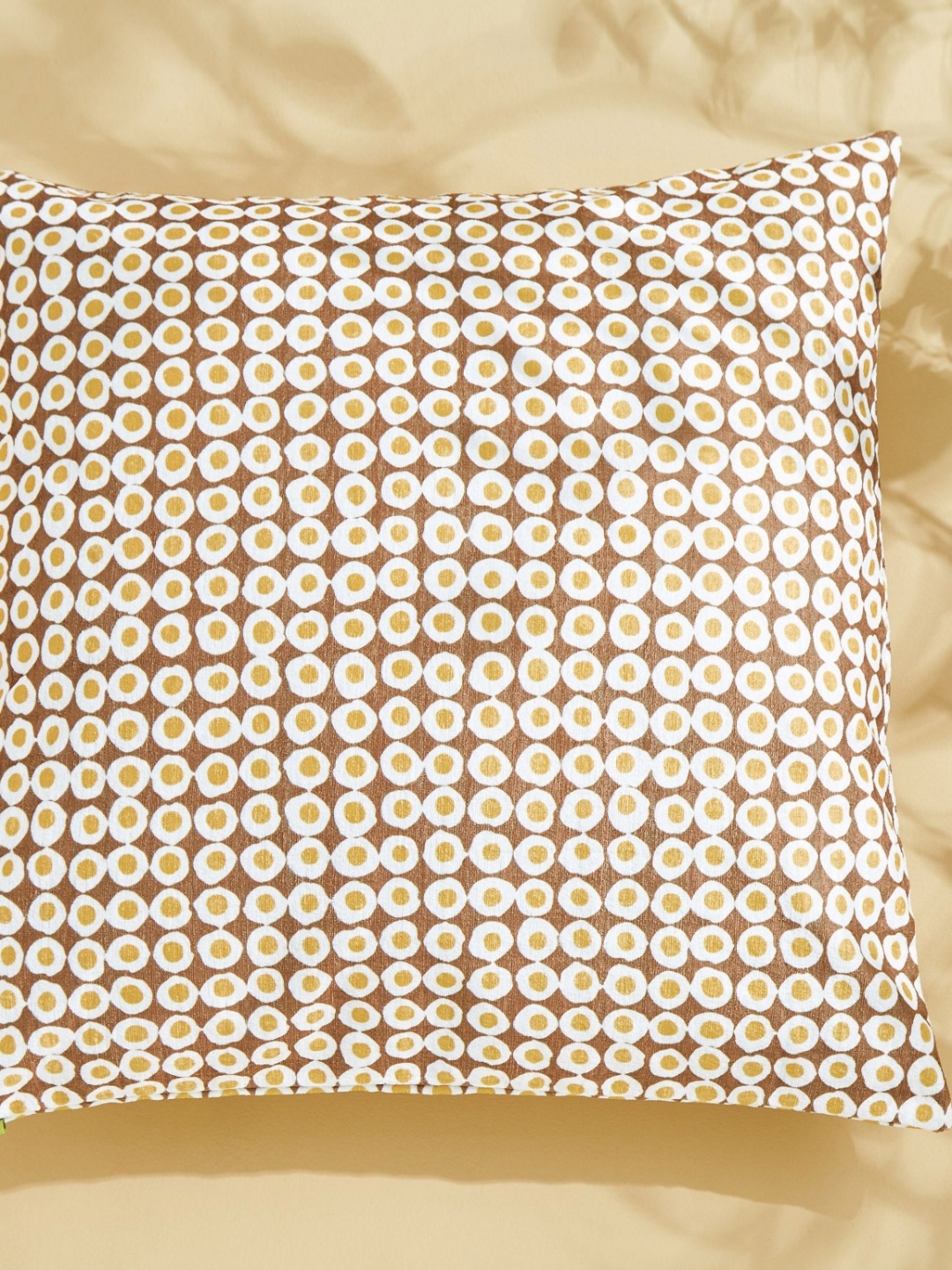 

Home Centre Celebrations Brown & White Polka Dots Square Shaped Cushion Cover