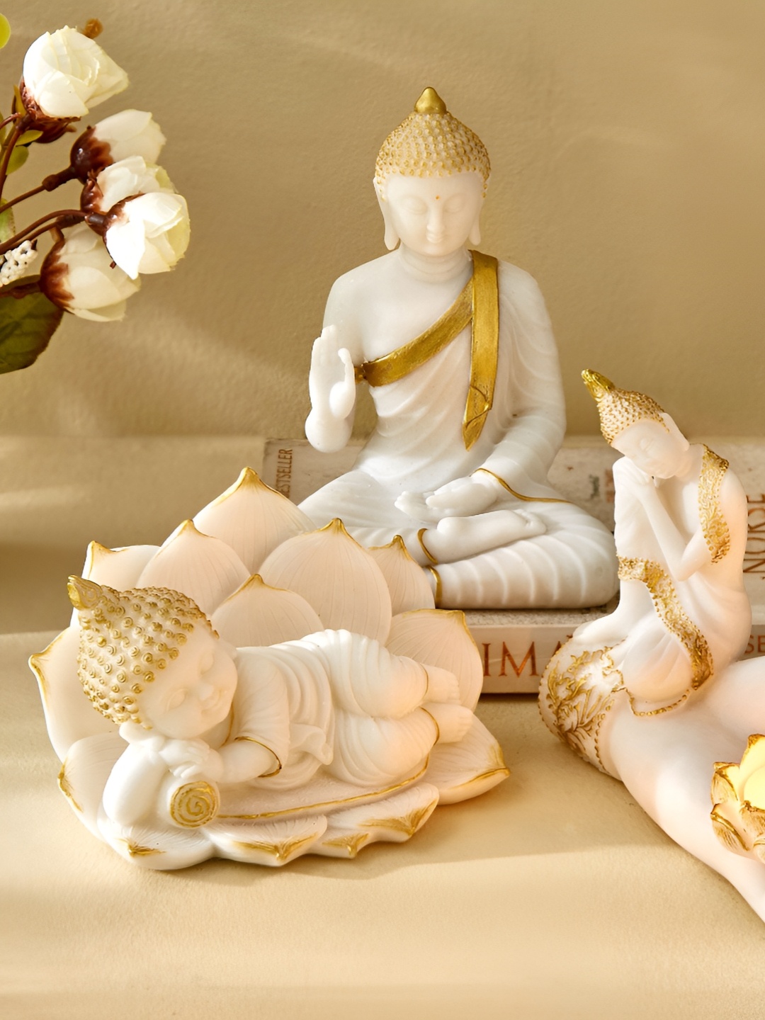 

Home Centre Noor Noe White & Gold-Toned Lord Buddha With T-Light Holder