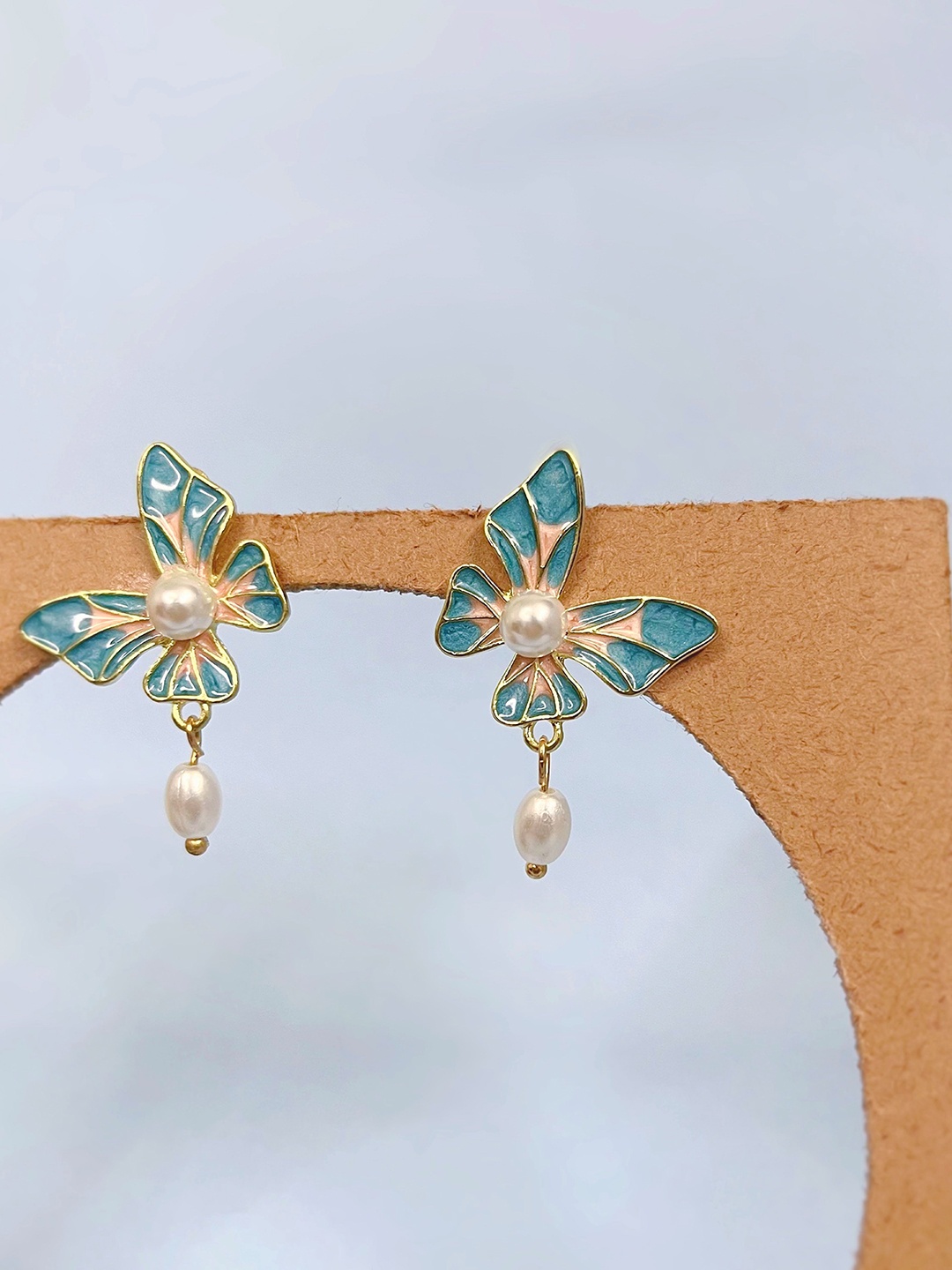 

SUBHAGALANKAR Feather Shaped Studs Earrings, Blue