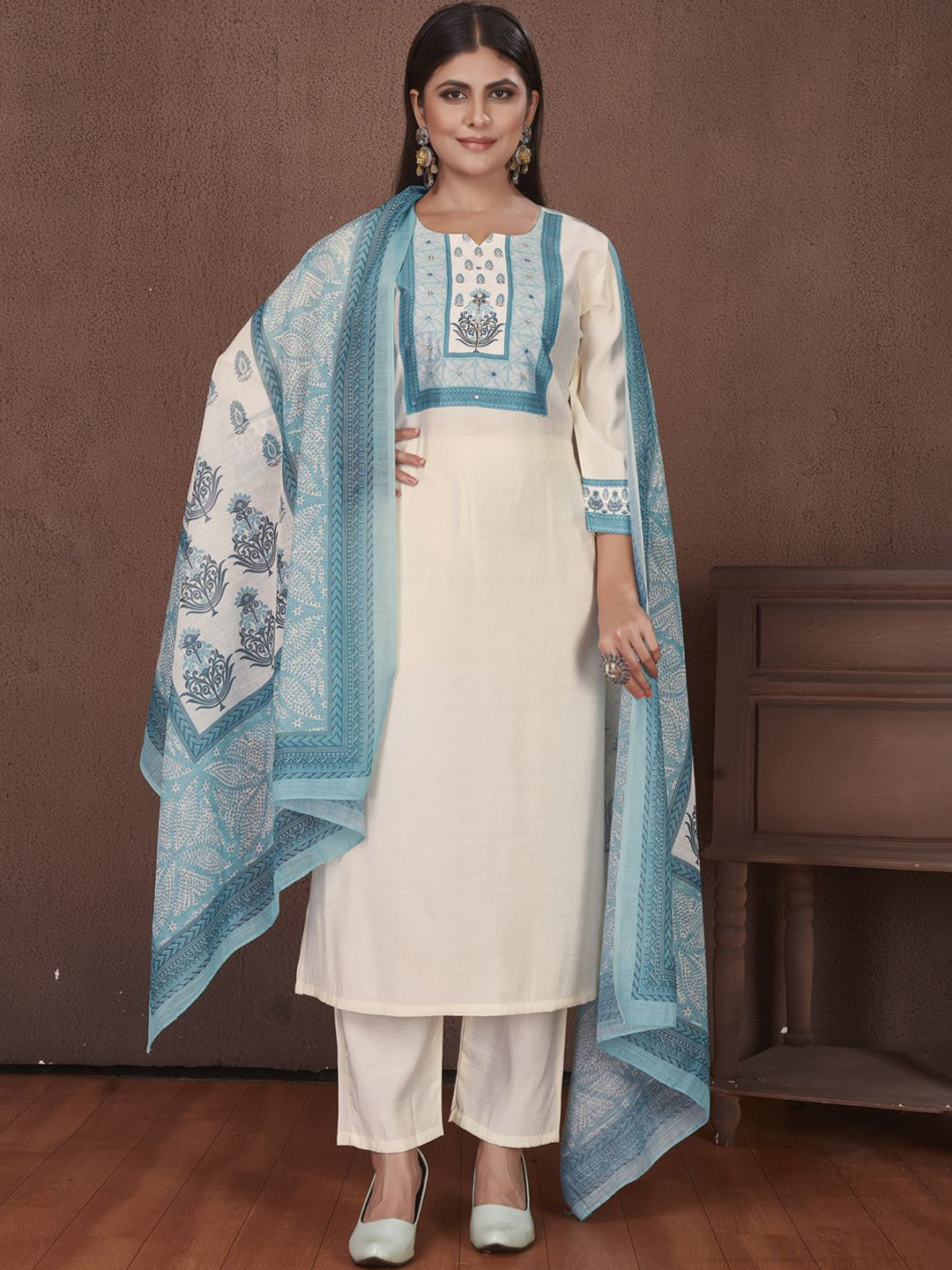 

STYLE SAMSARA Ethnic Motifs Yoke Design Regular Beads Work Kurta With Trouser With Dupatta, Cream
