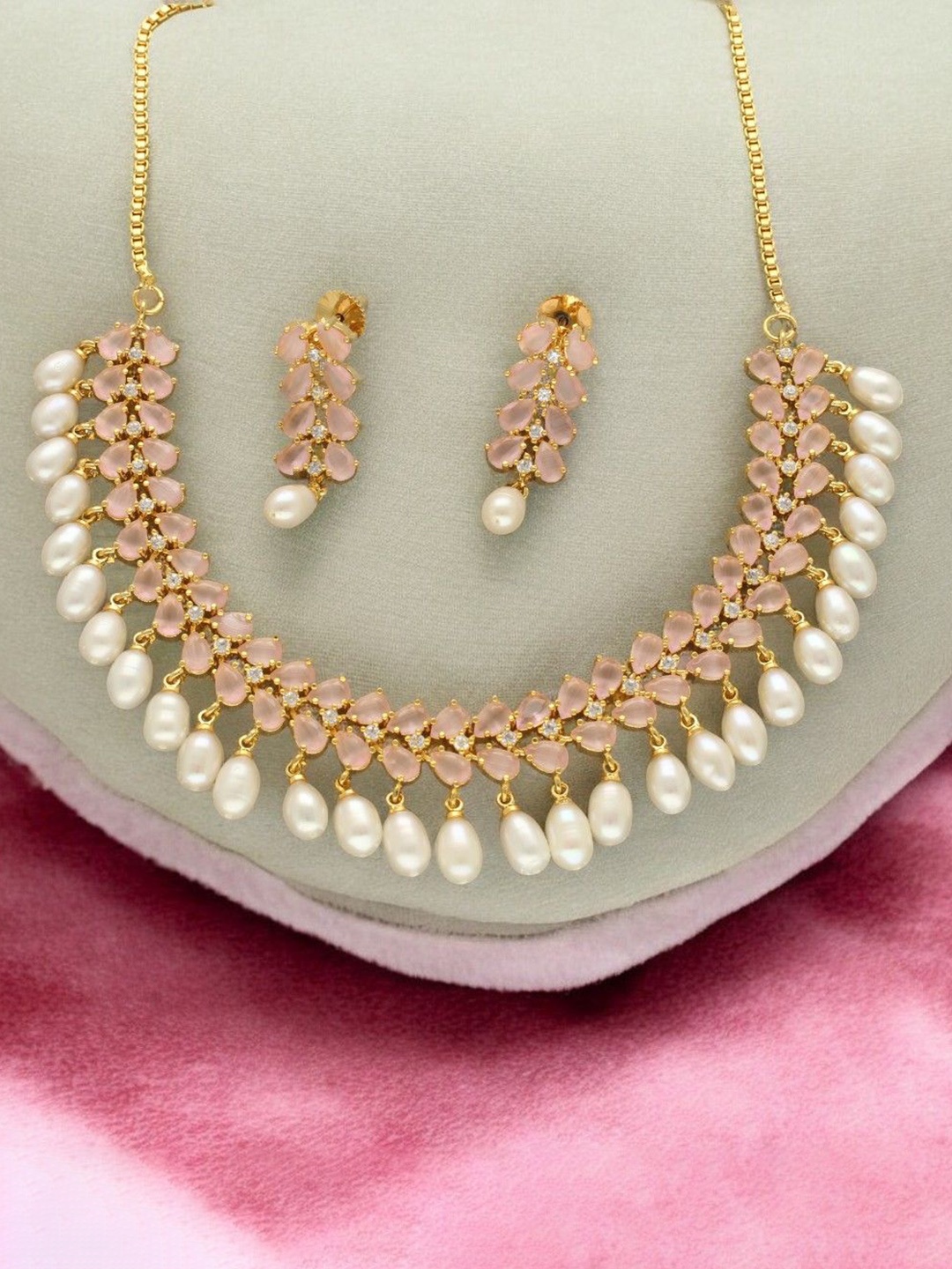 

Sri Jagdamba Pearls Dealer Gold- Plated Stone Studded & Beaded Jewellery Set