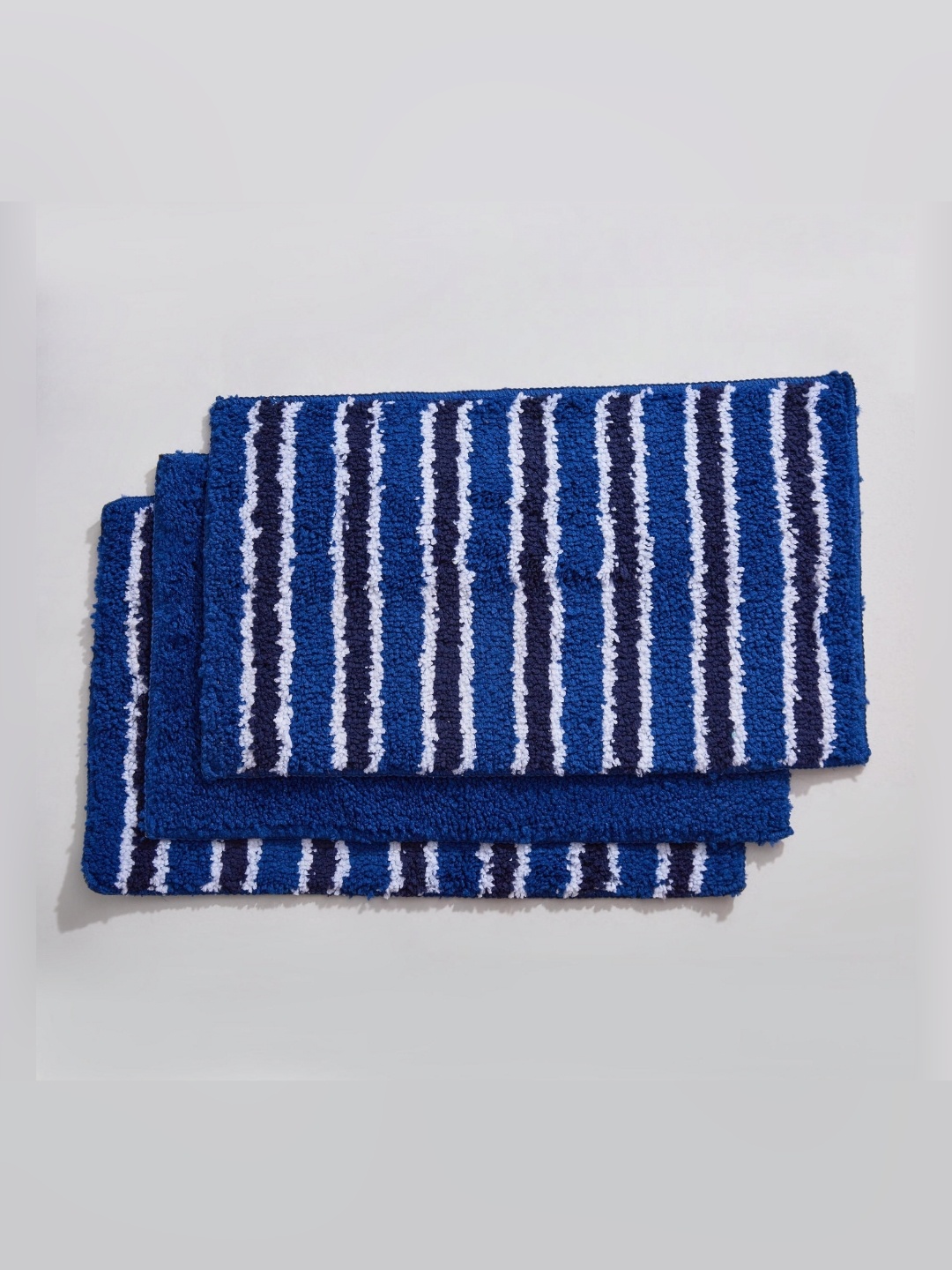 

Home Centre Fiesta 3-Pcs Blue & White Striped 120 GSM Bath Rugs