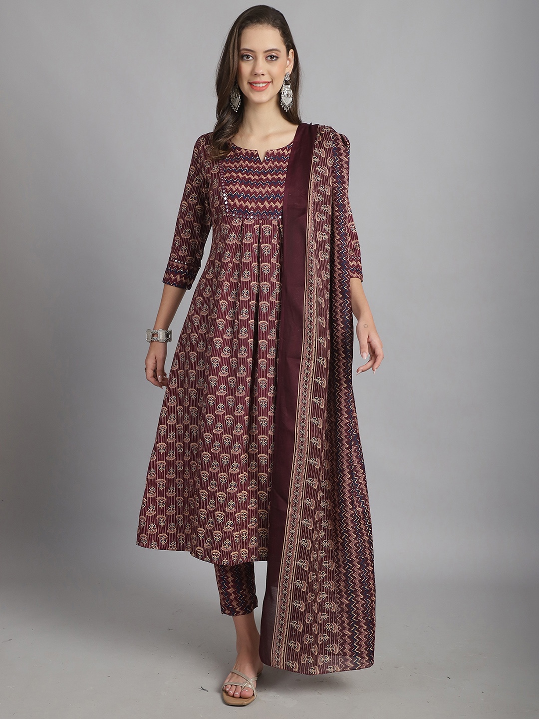 

Roly Poly Women Floral Printed Regular Kurti with Trousers & With Dupatta, Maroon