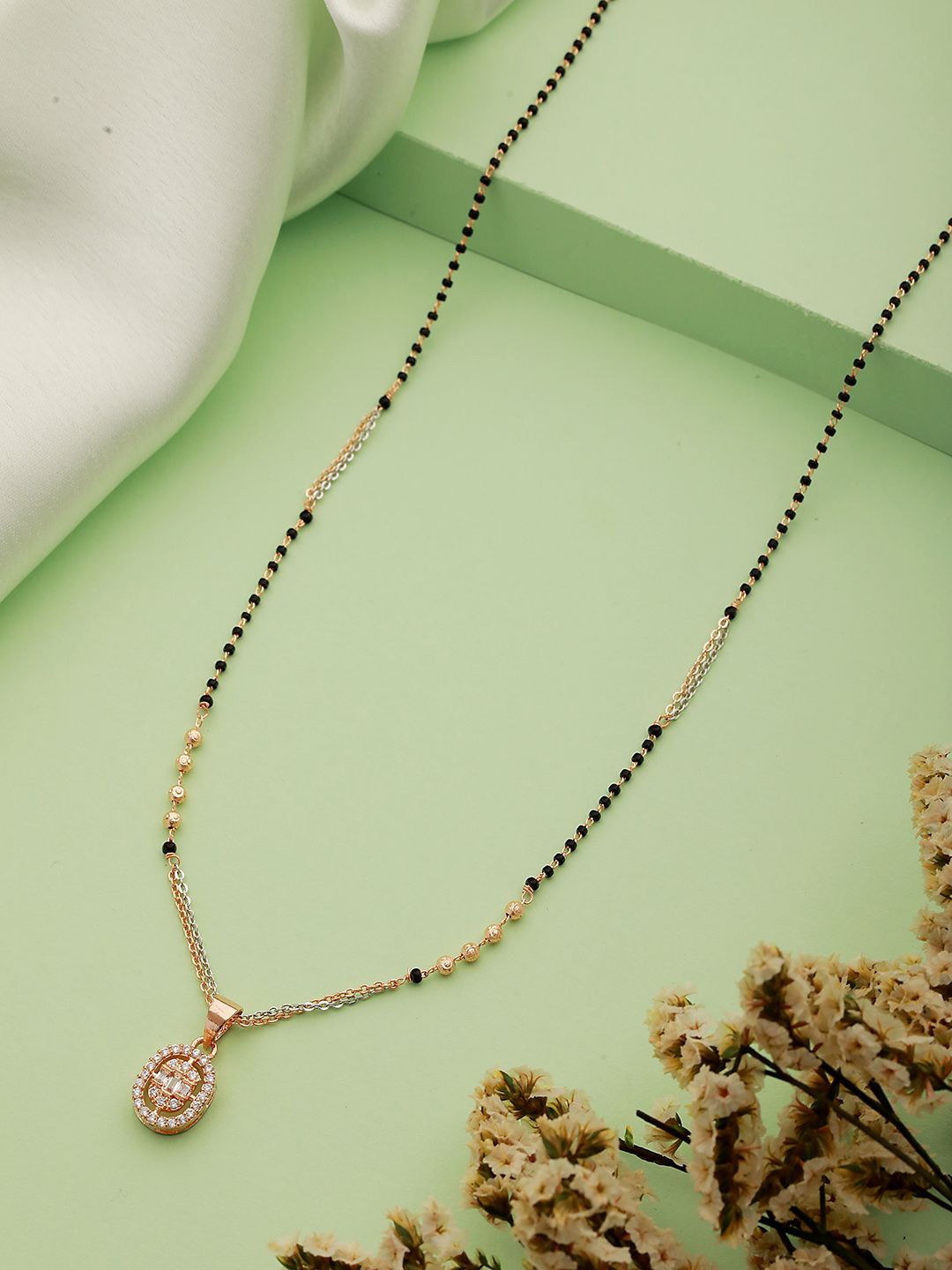

Jazz and Sizzle Rose Gold-Plated Cubic Zirconica Stone Studded & Beaded Mangalsutra