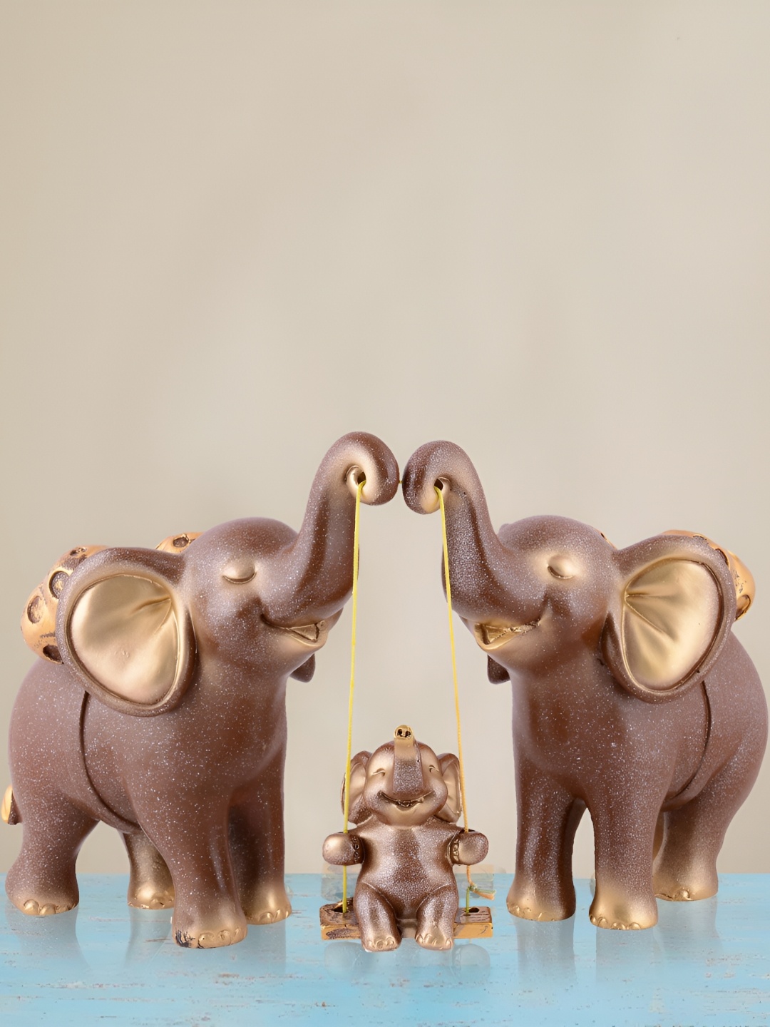 

Zart Camel Brown Elephant Figurine Showpiece