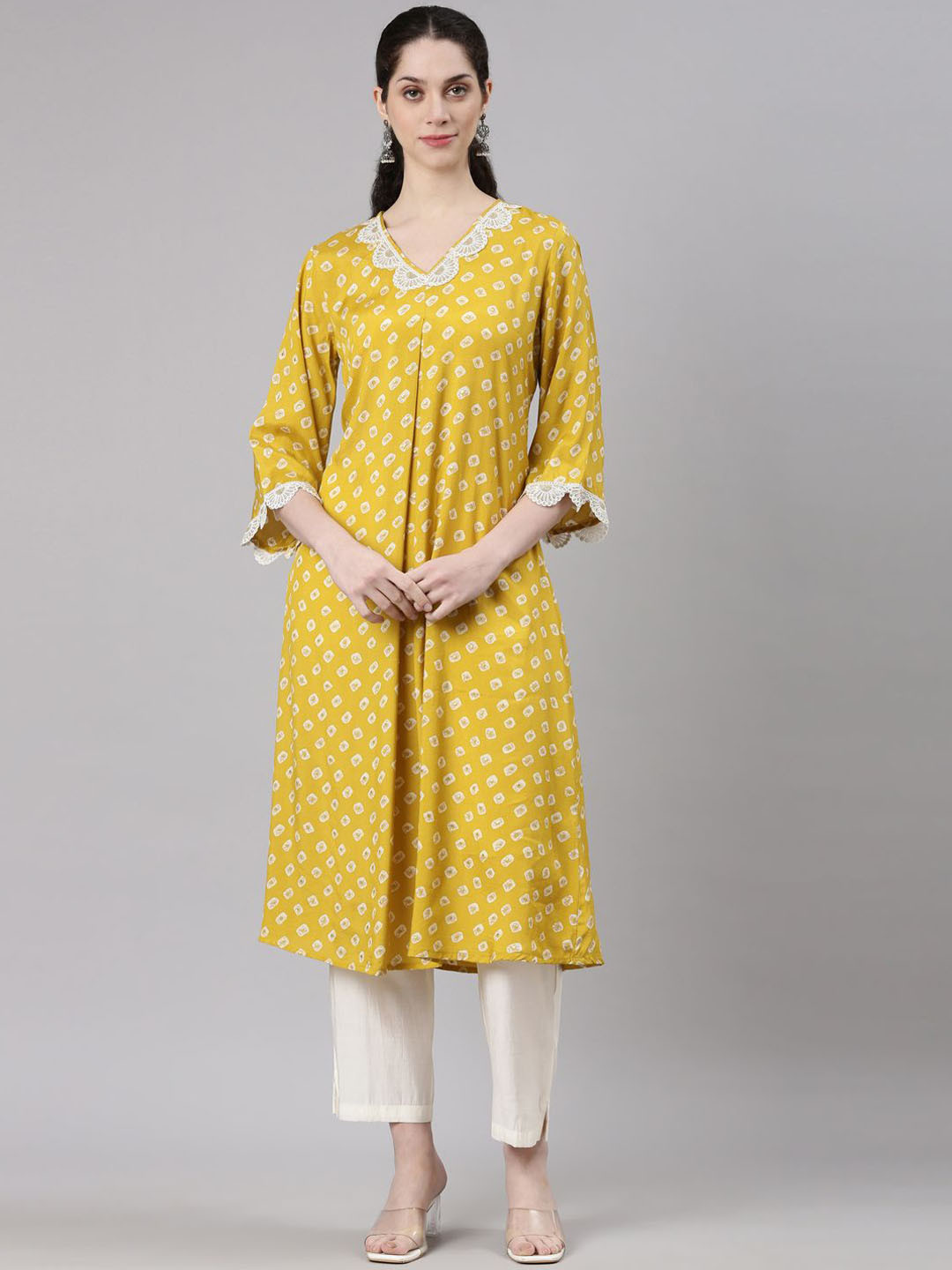 

Neerus Geometric Printed Patchwork Kurta with Trouser, Yellow