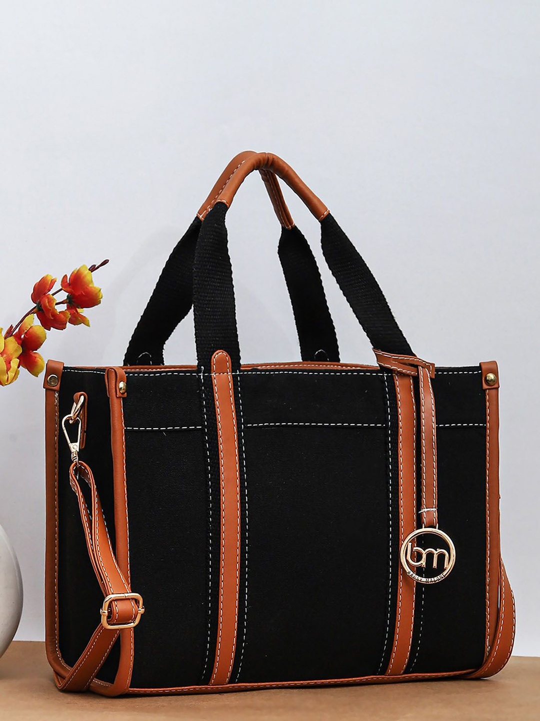 

Bagsy Malone Women Solid Structured Satchel Bag, Black