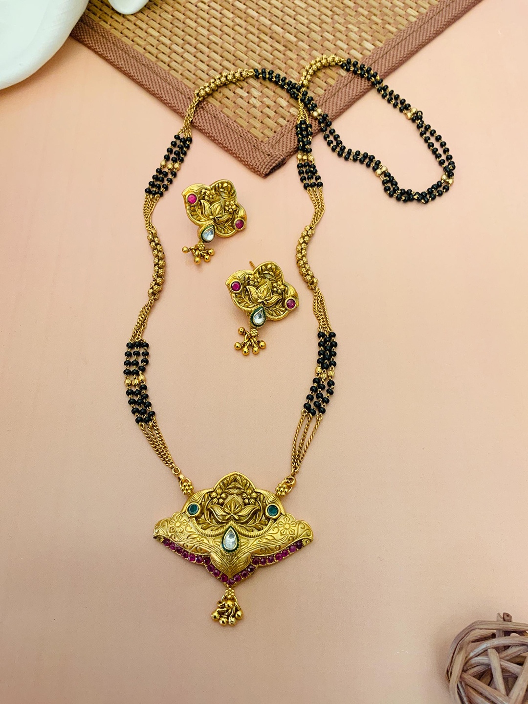 

ABDESIGNS Women Gold-Plated Artificial Stones and Beads Mangalsutra