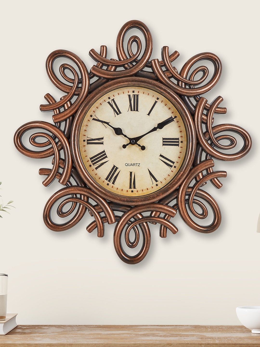 

Home Centre Corsica Fortune Bronze-Toned Printed Round Contemporary Analogue Wall Clock