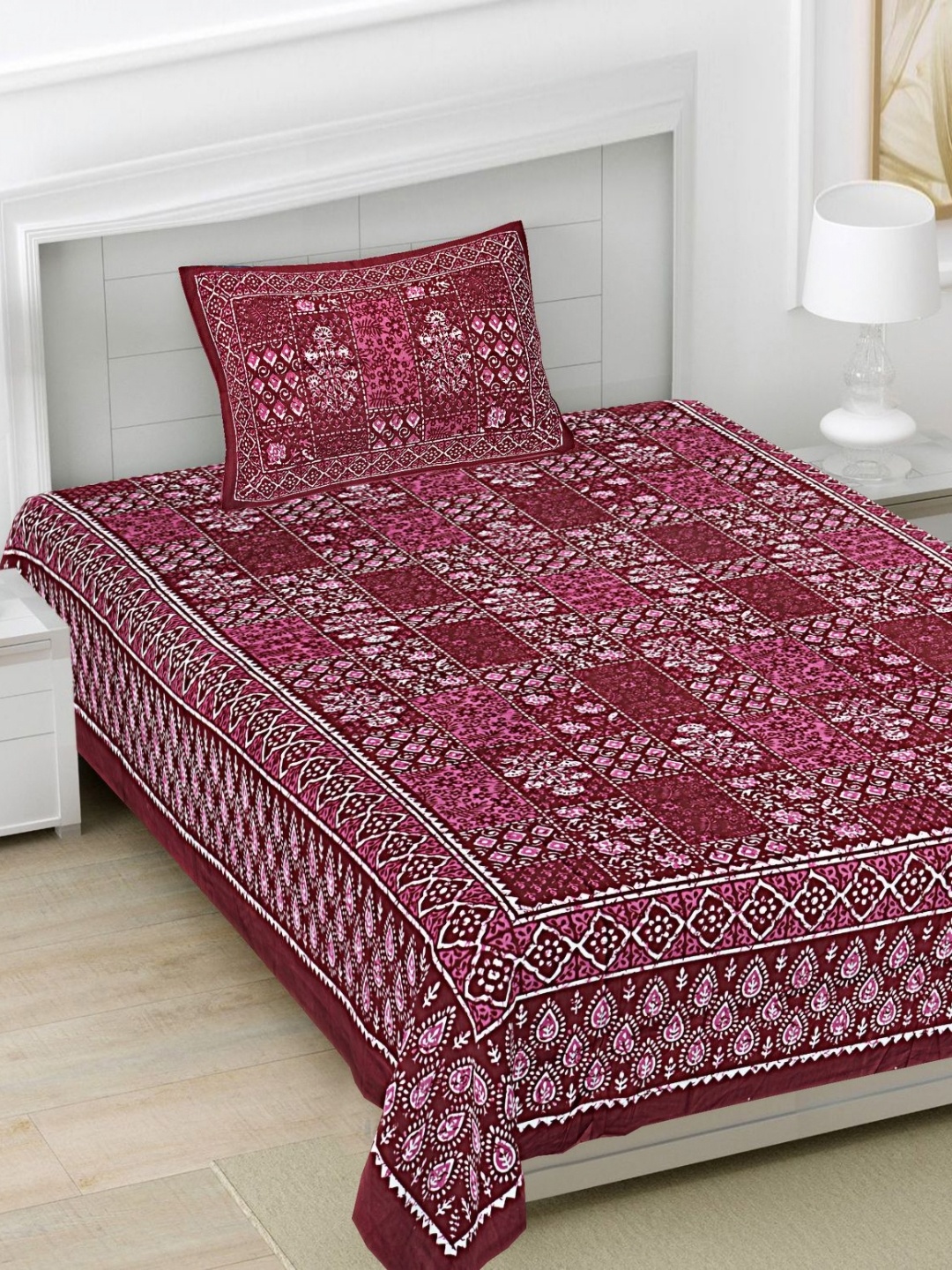 

FrionKandy Living Burgundy Ethnic Motifs 180 TC Cotton Single Bedsheet Set-2.28 m x 1.52 m