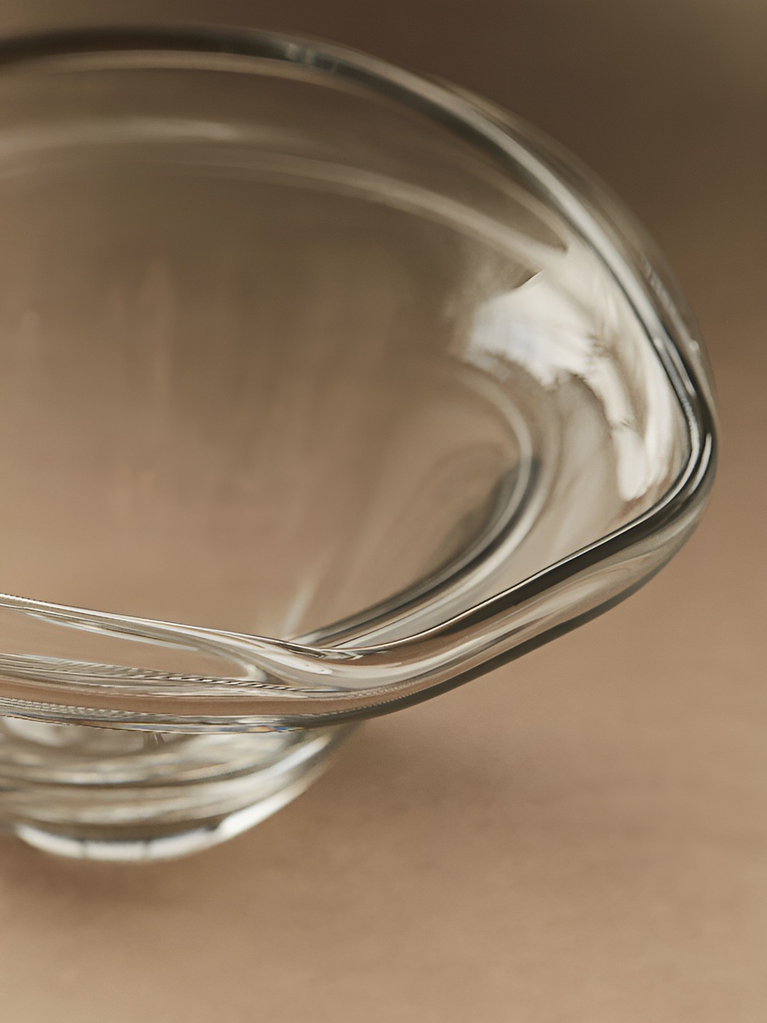 

H&M Transparent Asymmetric Glass Bowl