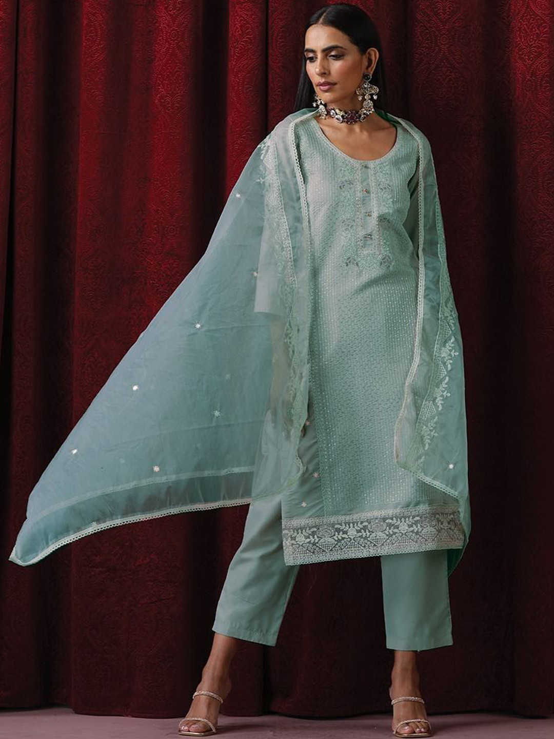 

Triyah Floral Embroidered Sequinned Cotton Silk Straight Kurta With Trouser & Dupatta, Blue