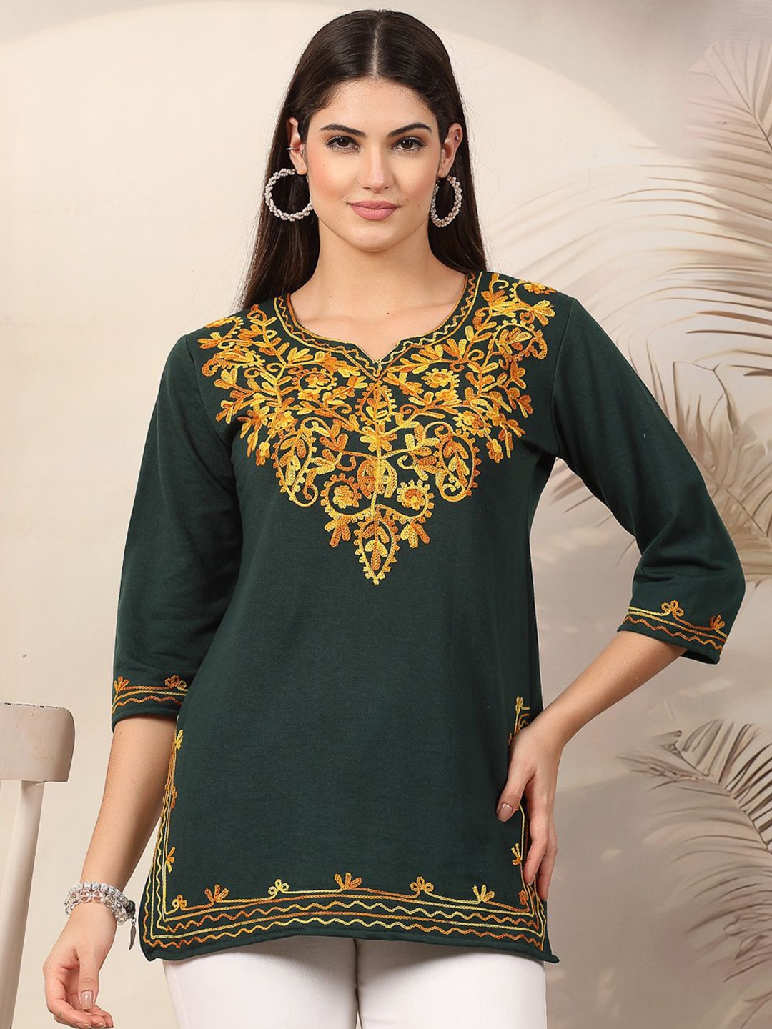 

Clora Creation Floral Embroidered Woollen Straight Kurti, Green